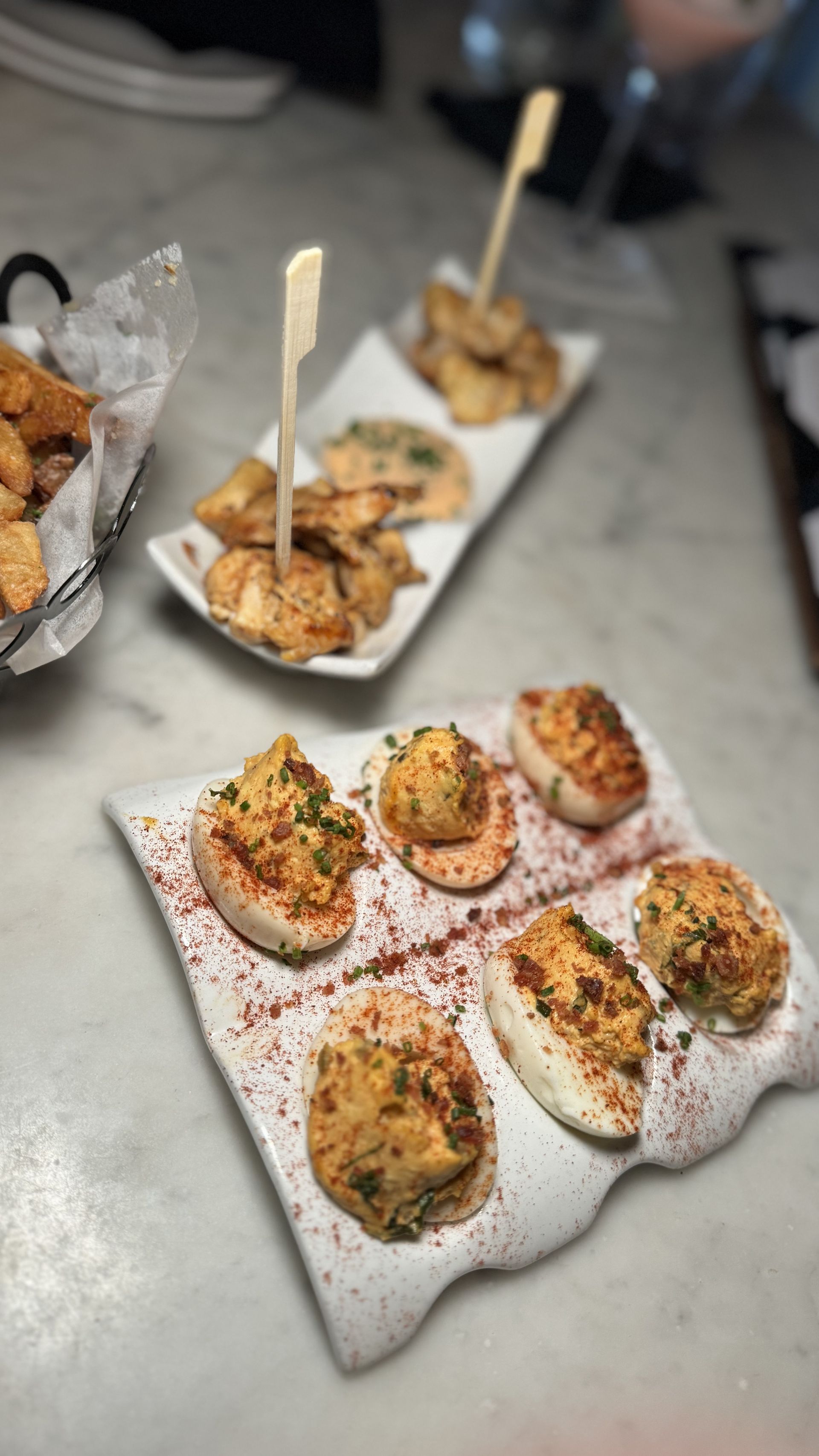 The Beverly - A close up of a plate of food on a table.