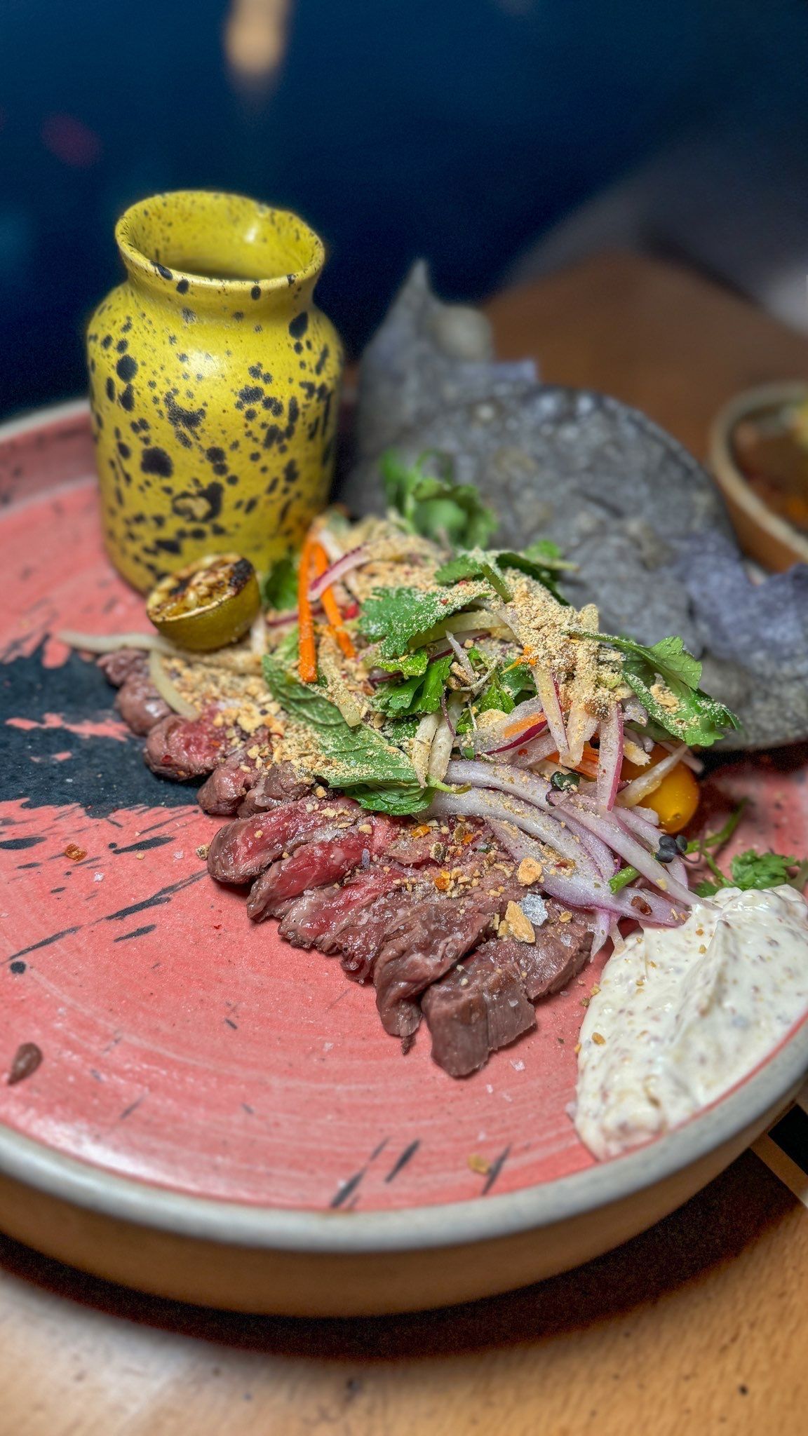 A close up of a plate of food on a table.