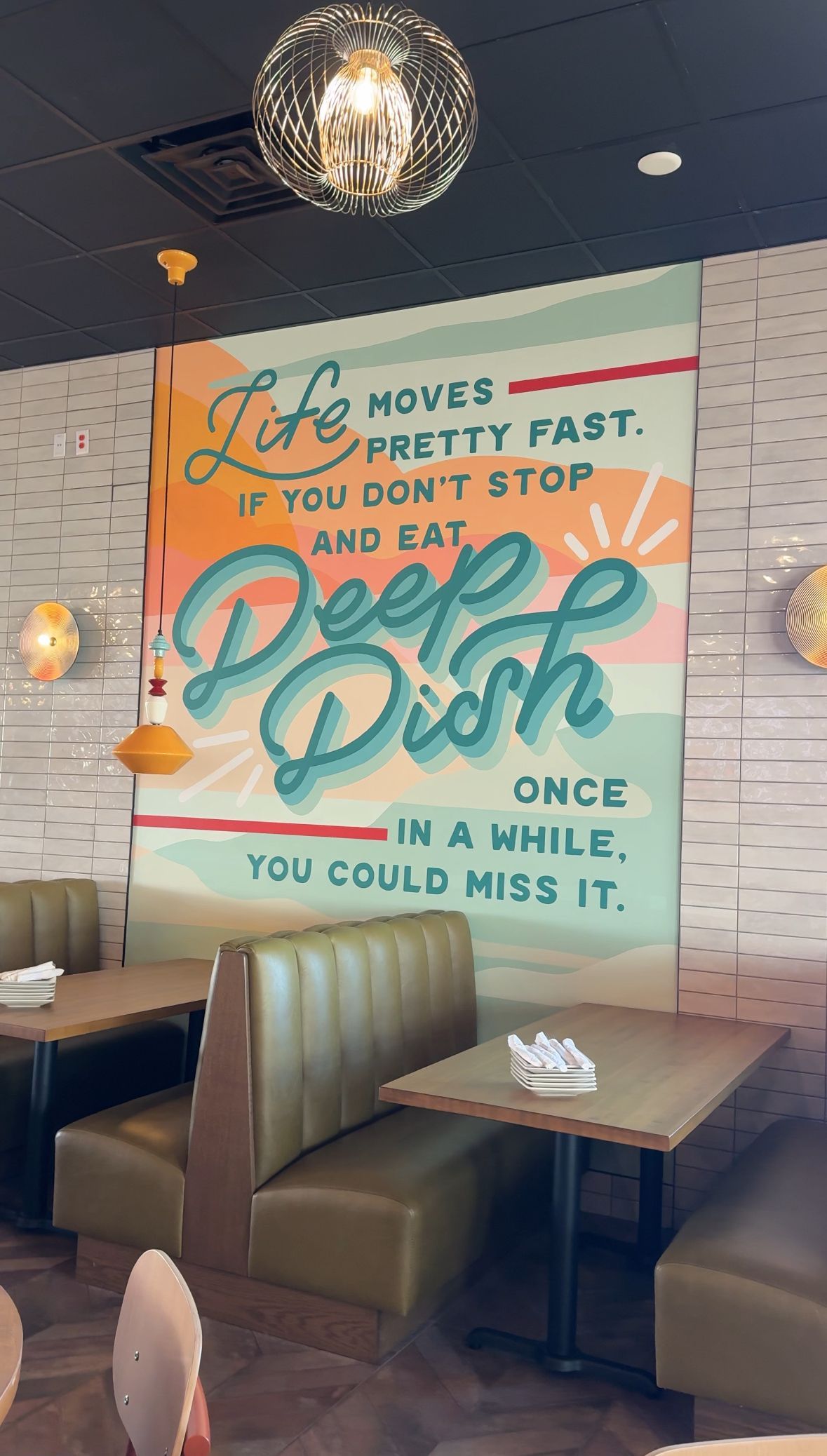A diner with a sign that says life moves pretty fast if you don 't stop and eat