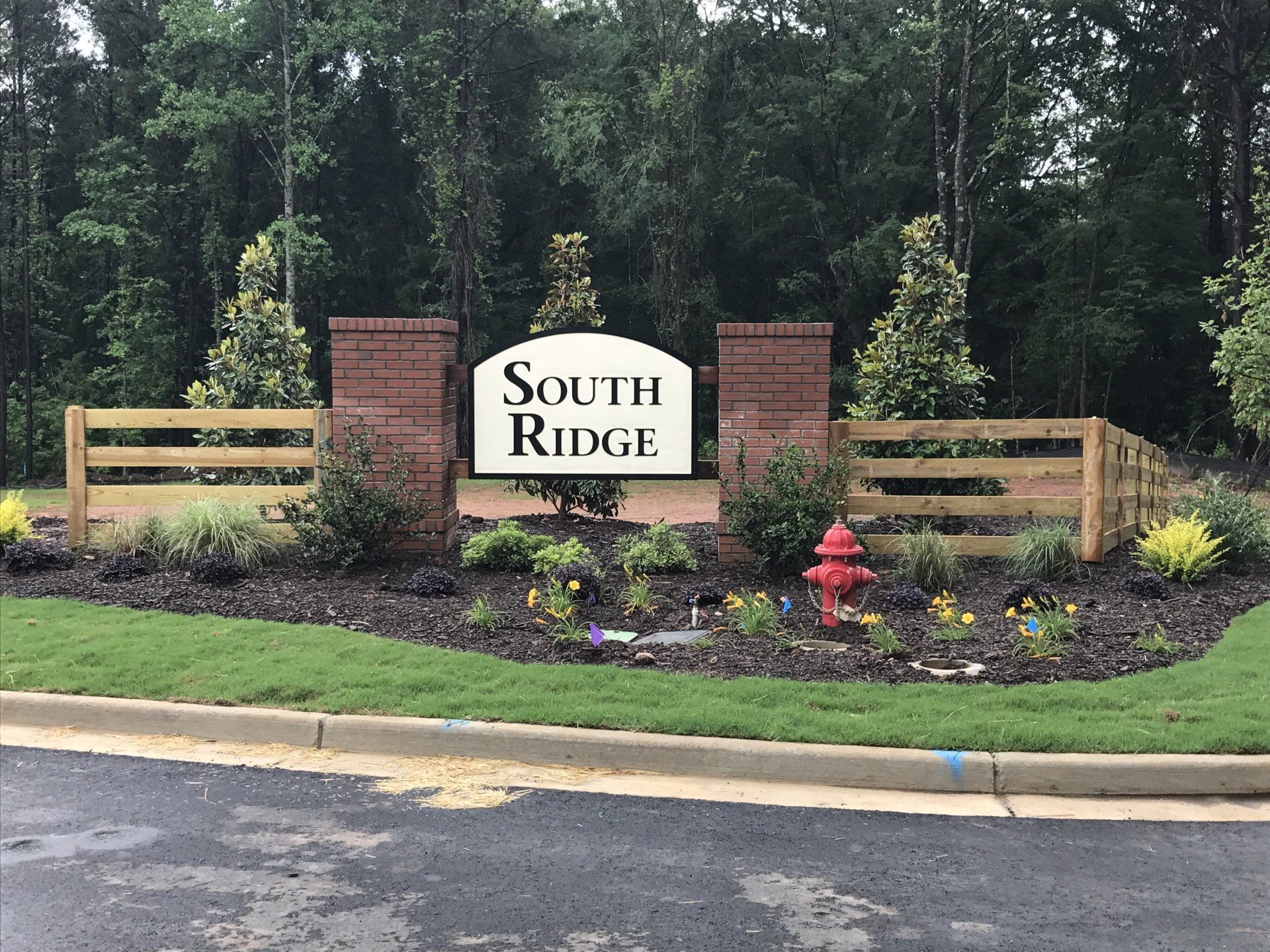 A sign that says south ridge on it