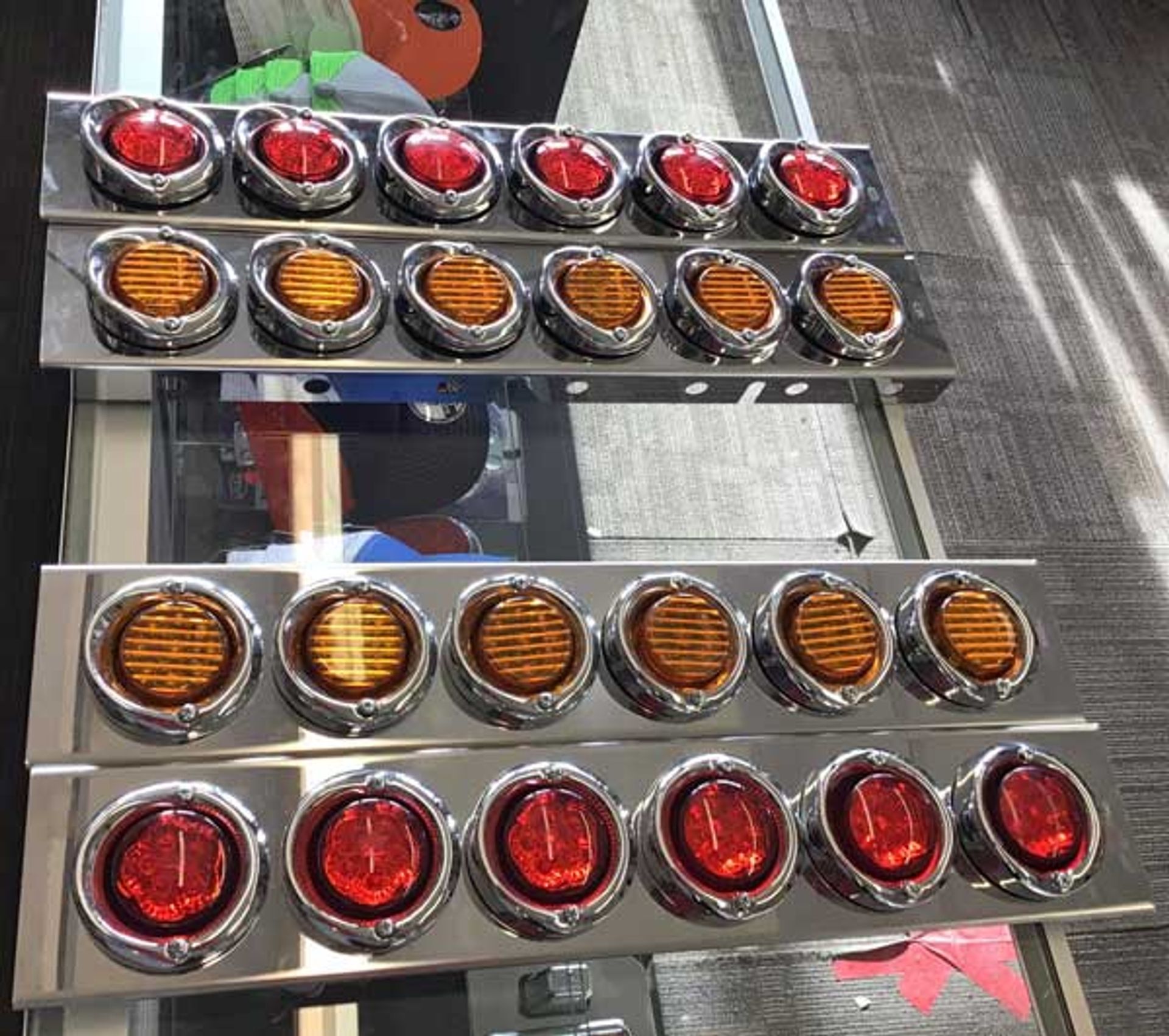 A bunch of lights are lined up on a table