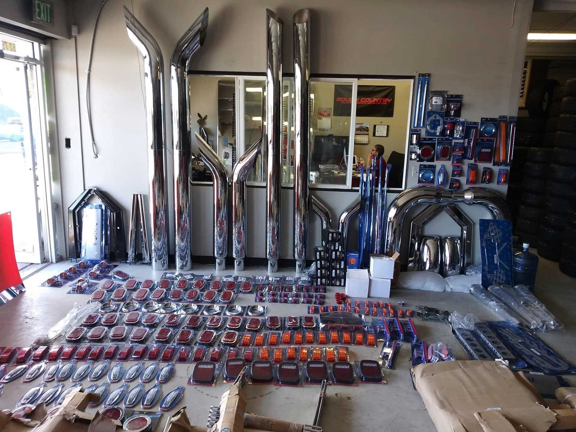 A bunch of exhaust pipes are sitting on a table