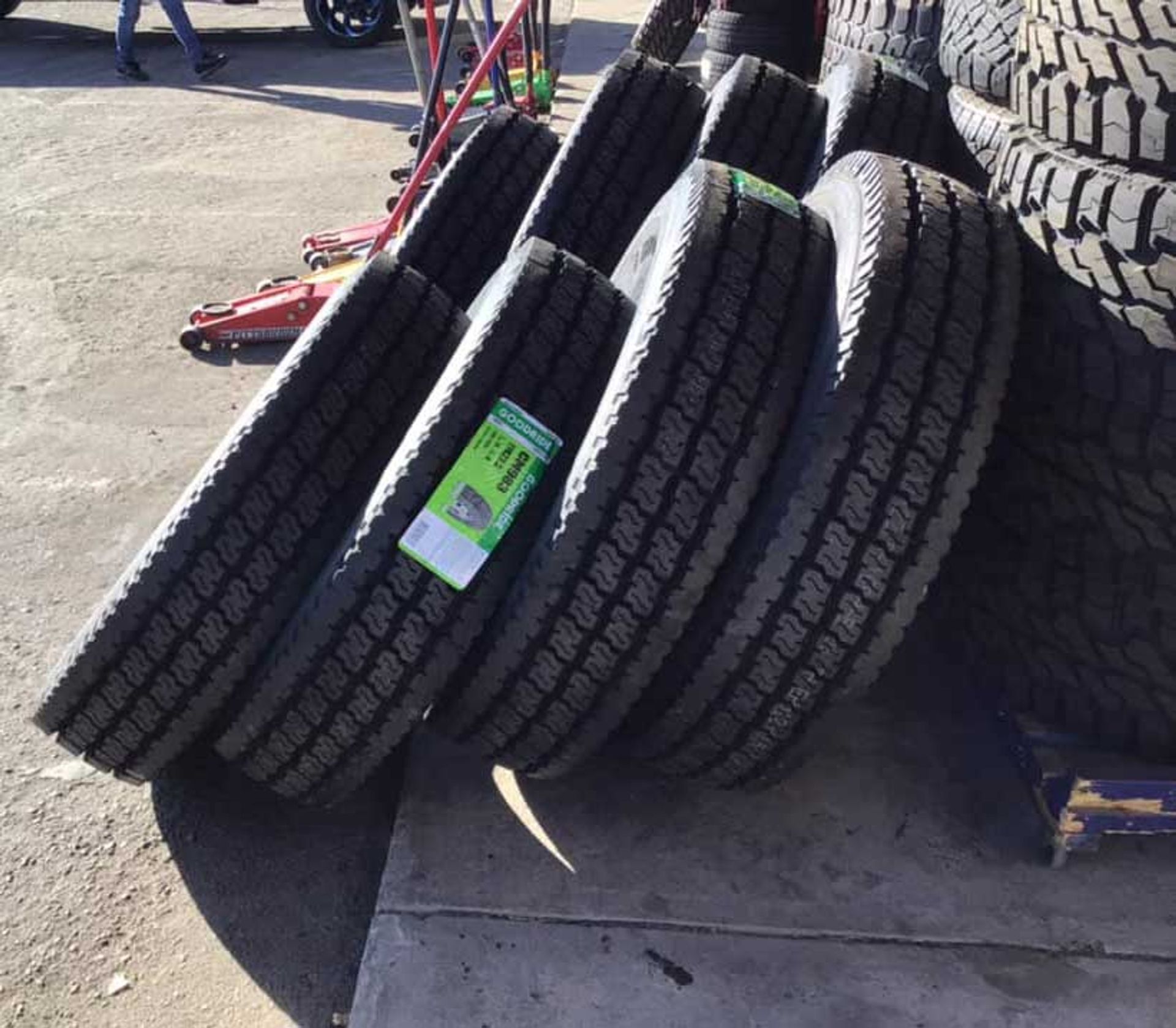 A bunch of tires are stacked on top of each other