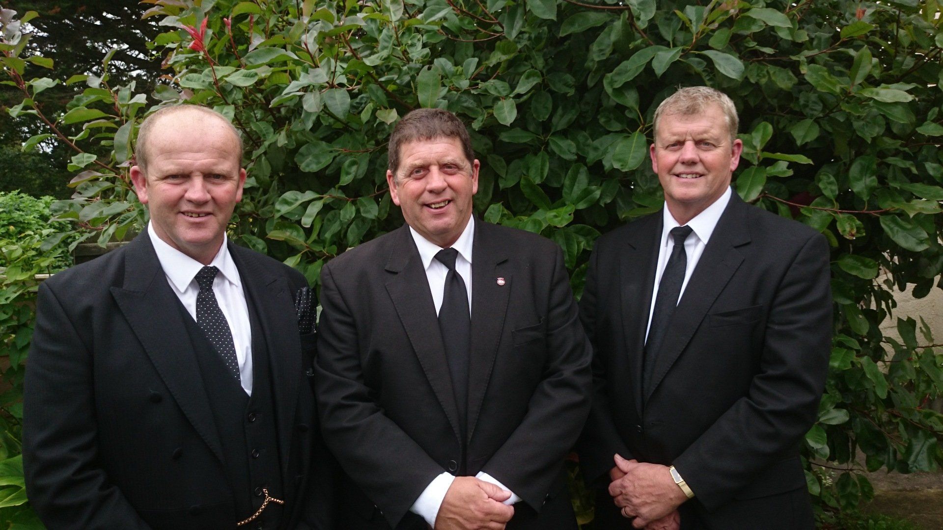a team of funeral directors