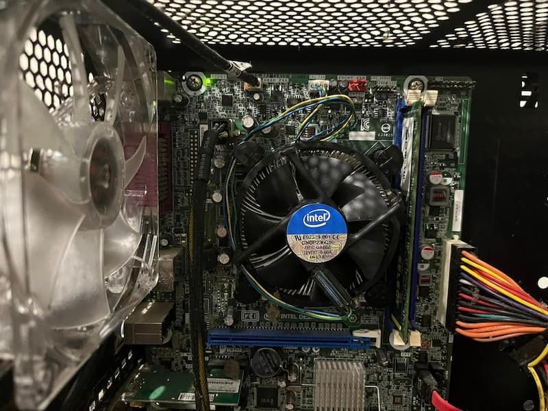 An Intel CPU With A Fan Attached To It - IT Services in Newcastle, NSW