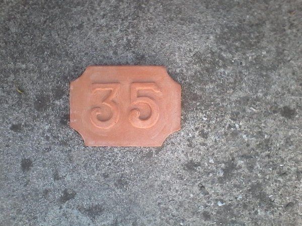 Numeri civici in terracotta