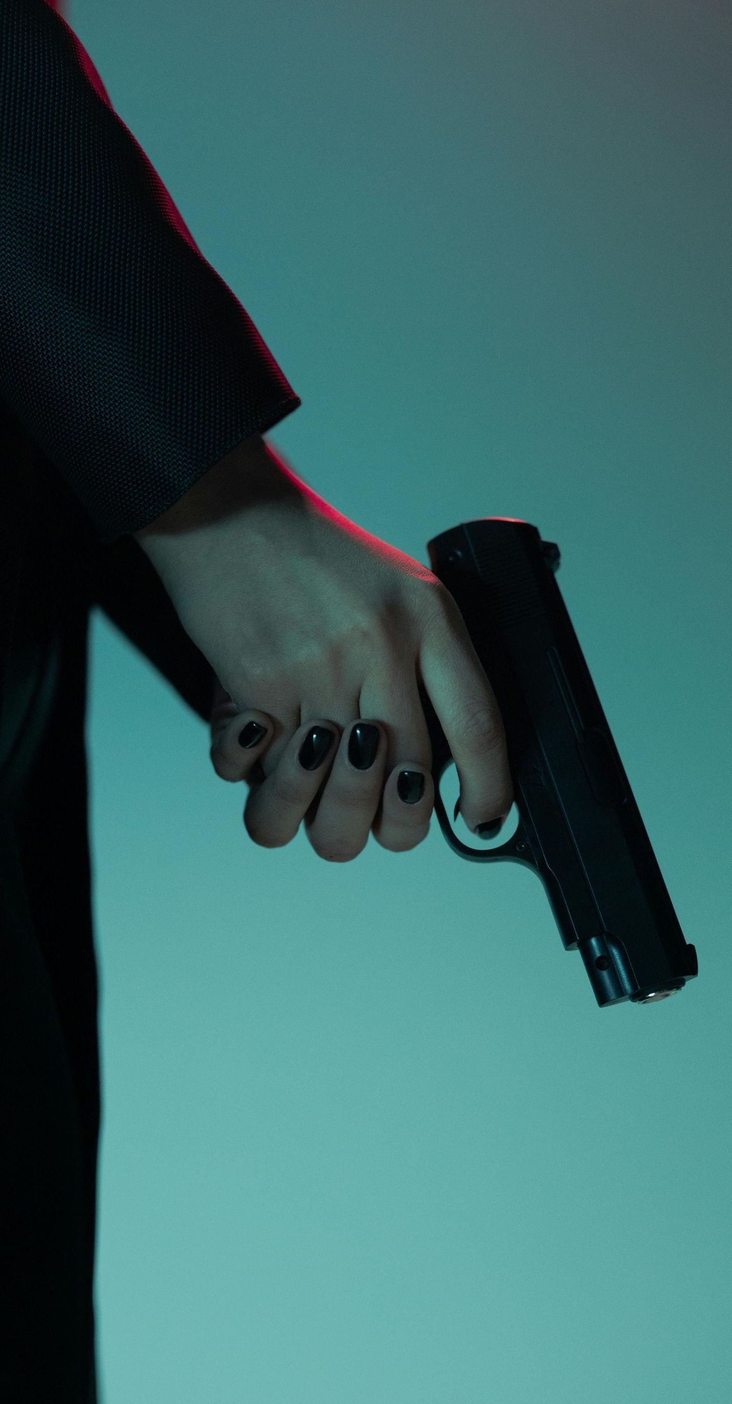 woman holding a handgun