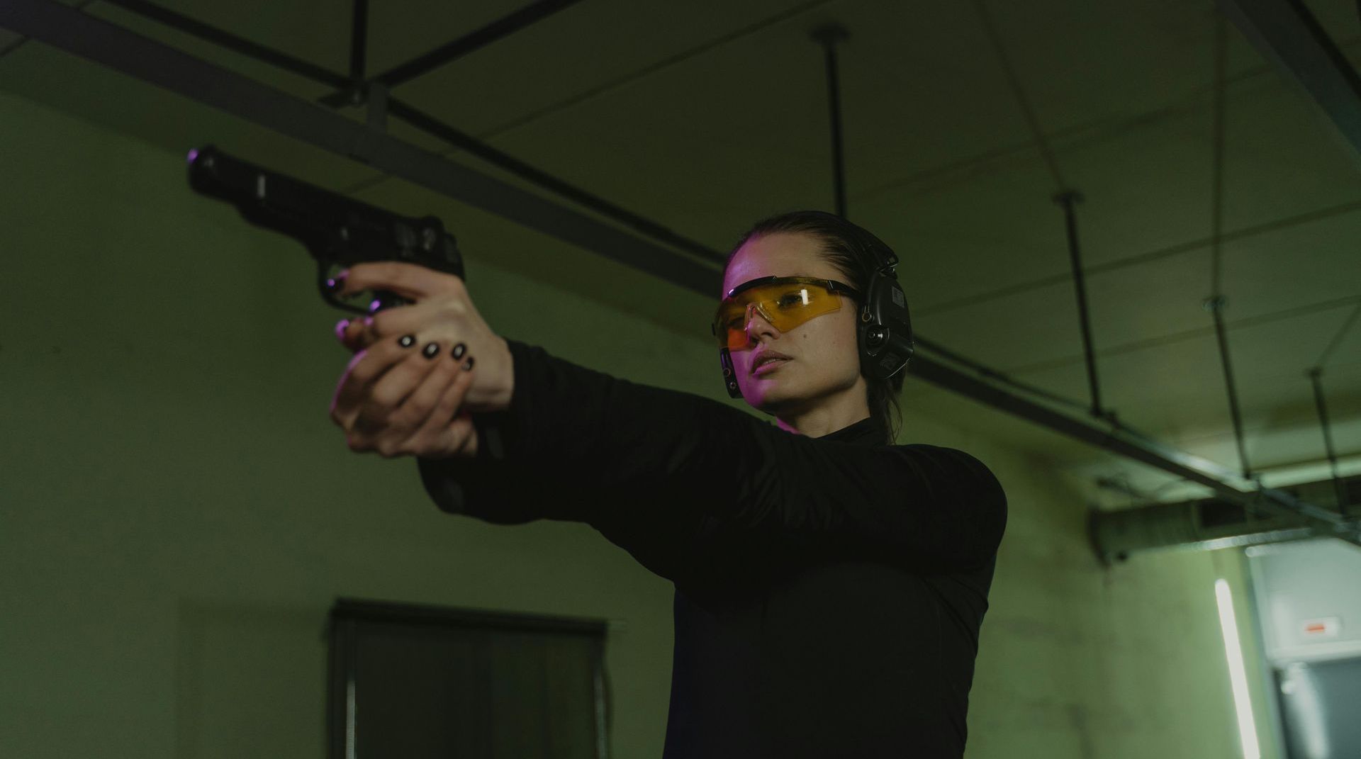 woman shooting a handgun