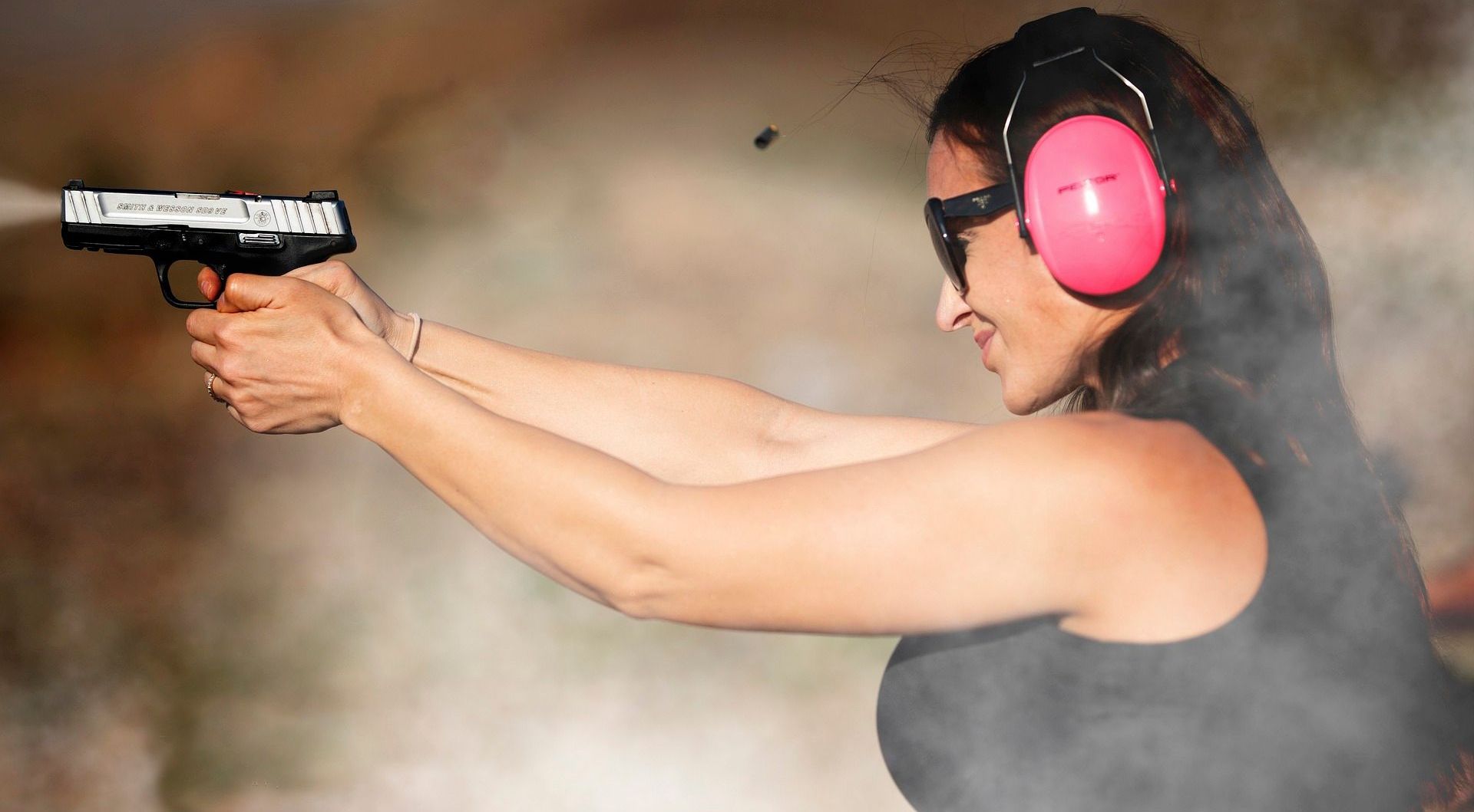 woman shooting a gun