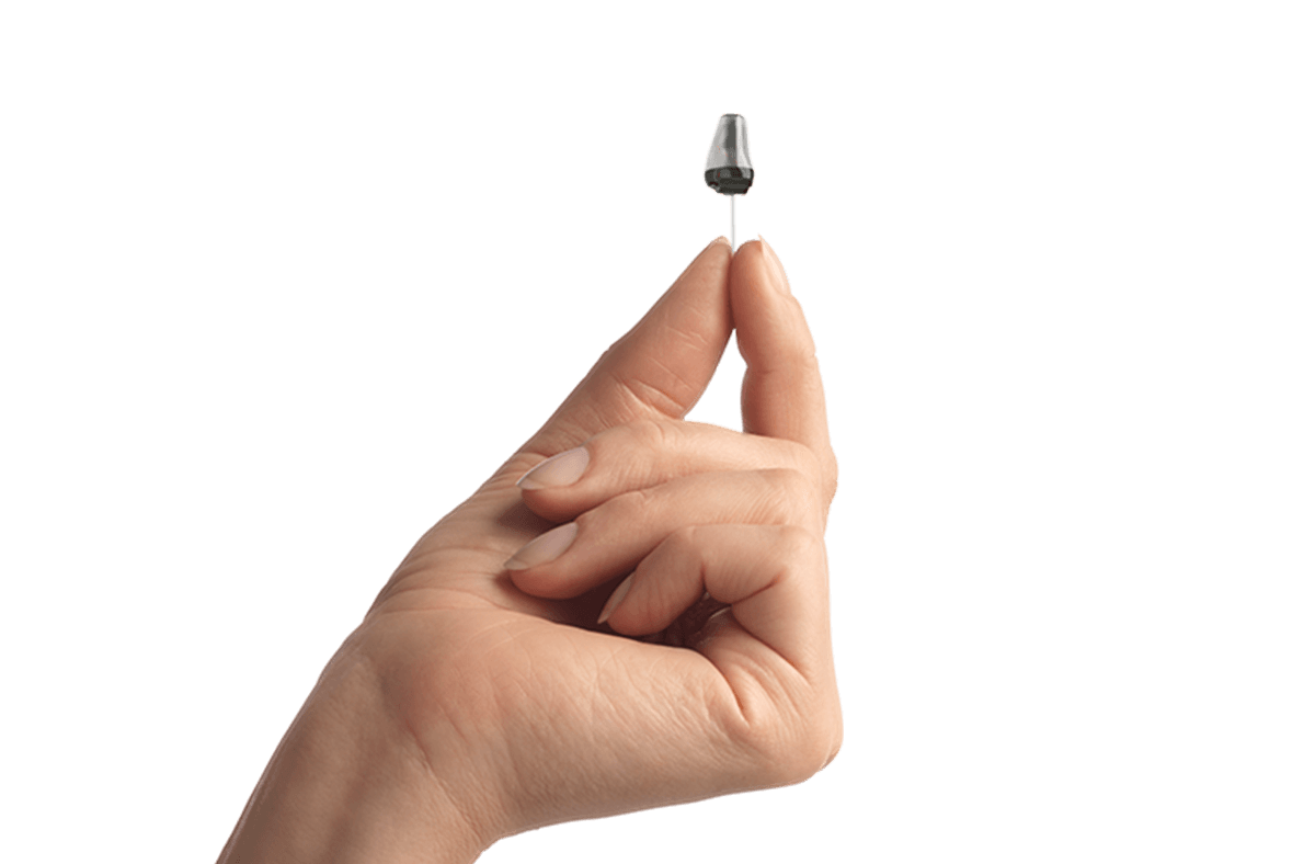 hearing aid in users hand