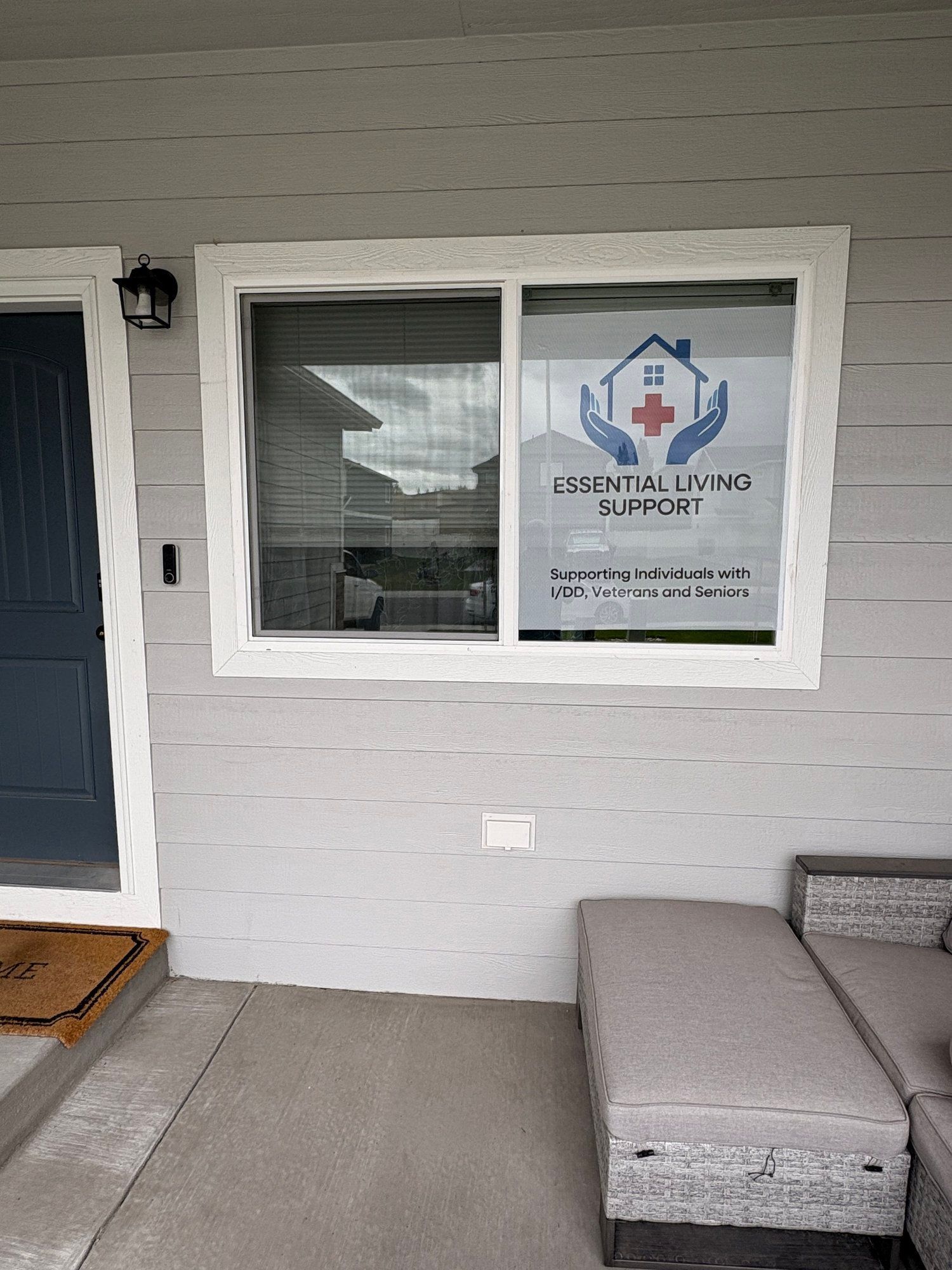 Outdoor waterfront scene with a building sign and open sky, community presence in Panama, FL