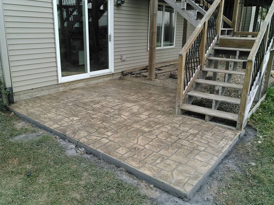 House with stairs outside leading to higher area — Cedar Rapids, IA — Earthworks Concrete