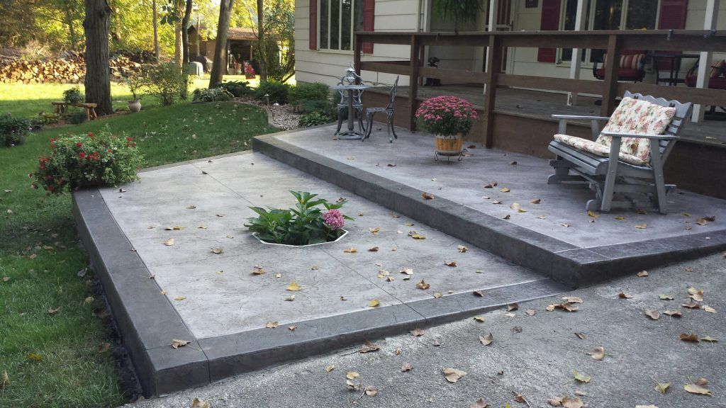 Two level stone patio — Cedar Rapids, IA — Earthworks Concrete