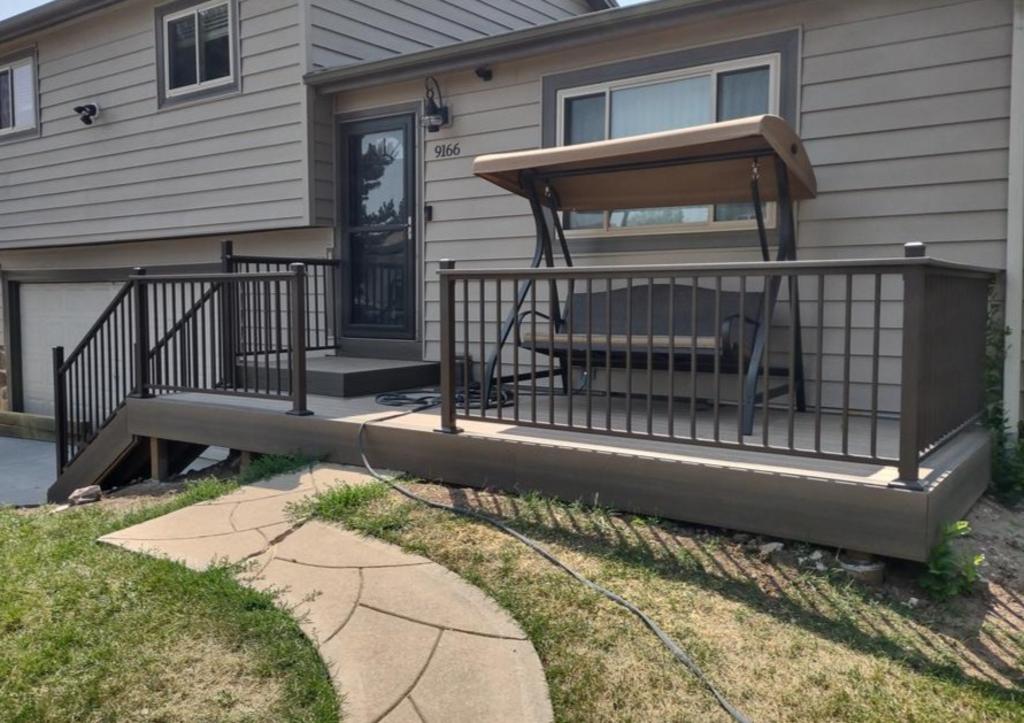 deck with hanging chair