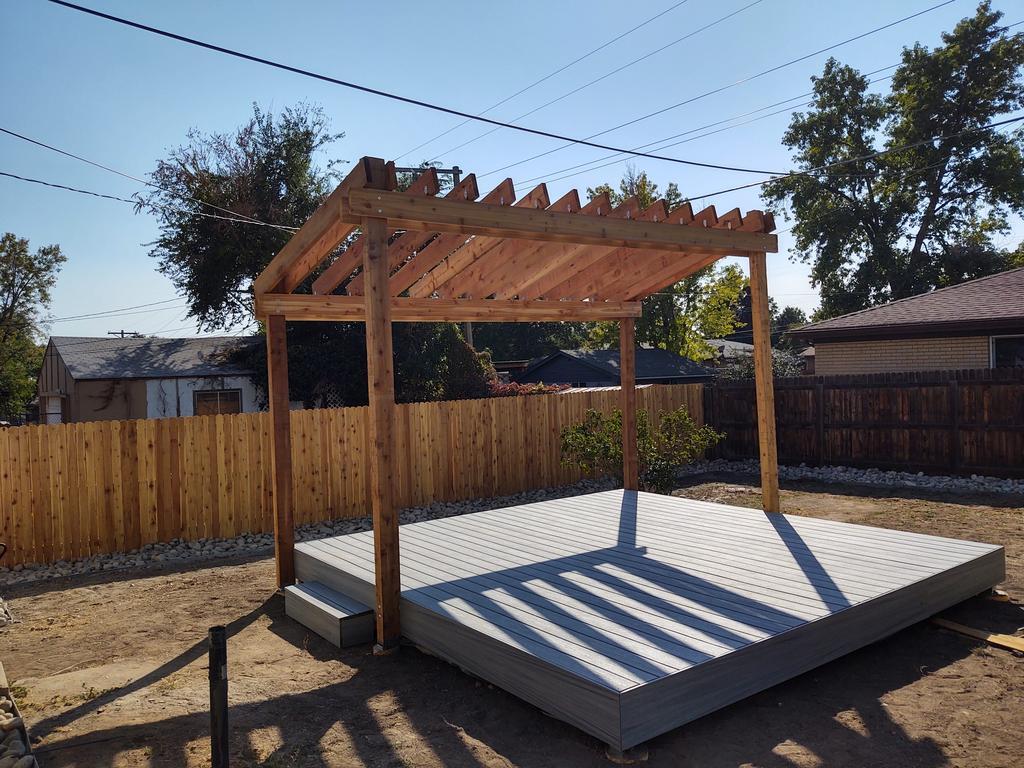 pergola with wooden fences