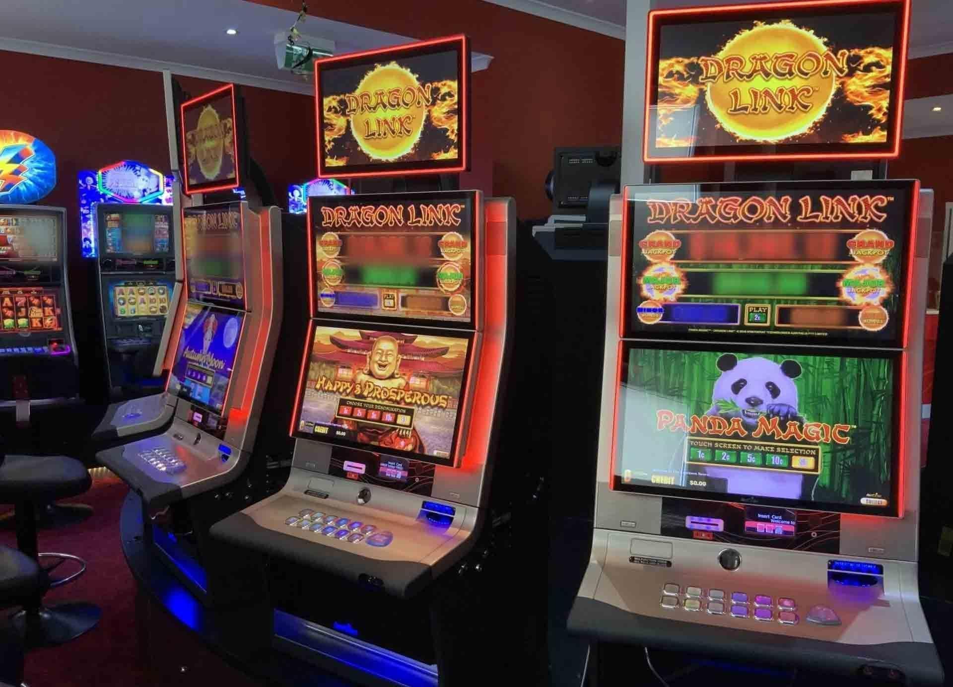 Slot Machines in a Dimly Lit Room, Featuring