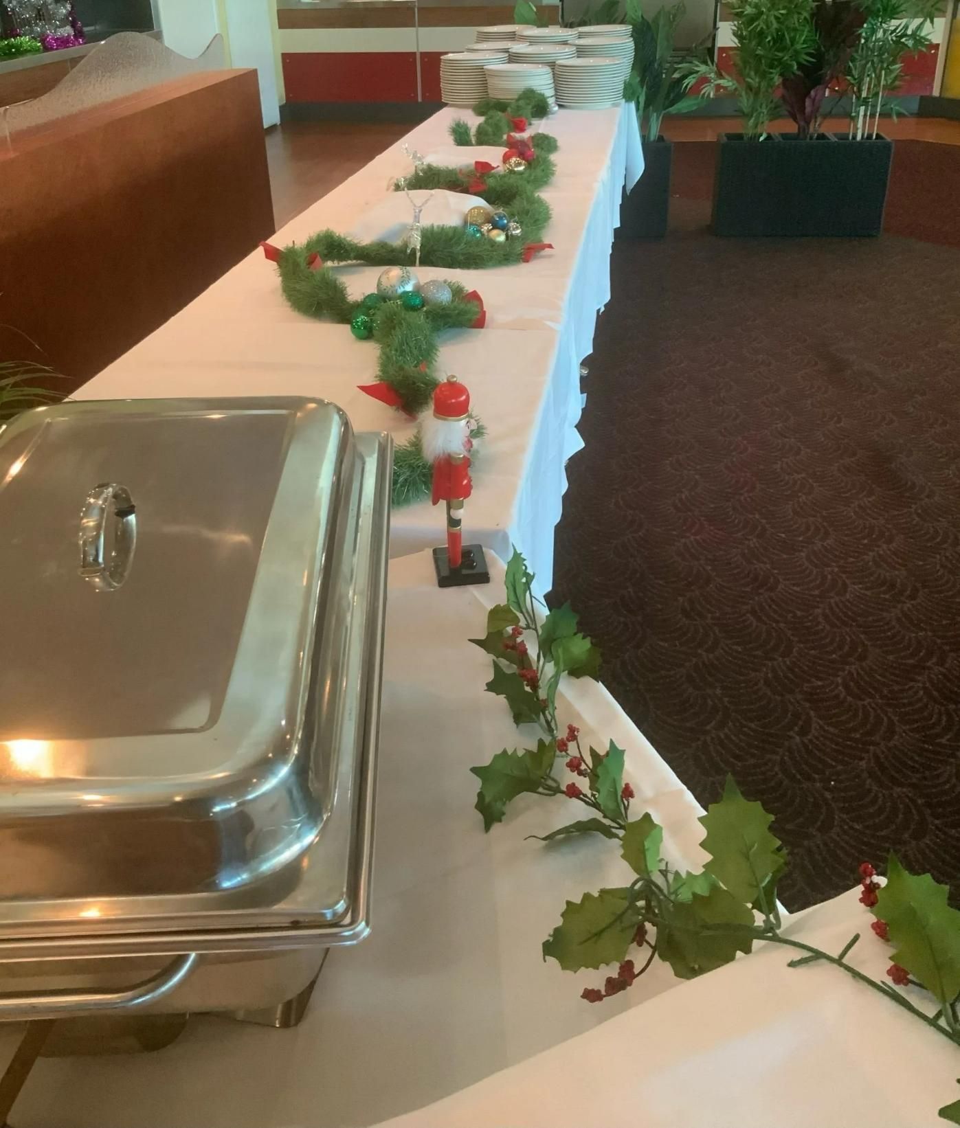 Buffet Table Set for a Holiday Meal, With Stainless Steel Chafing Dish — Capricorn Tavern in Taranganba, QLD