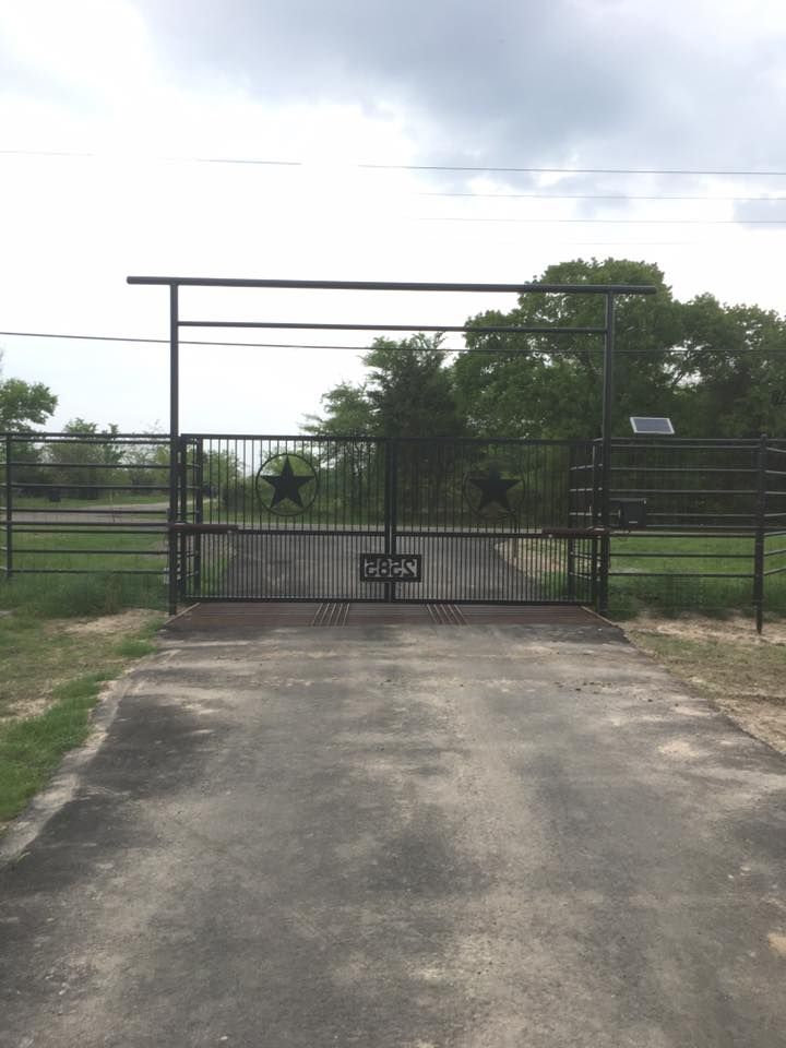 A fence with a sign that says texas on it