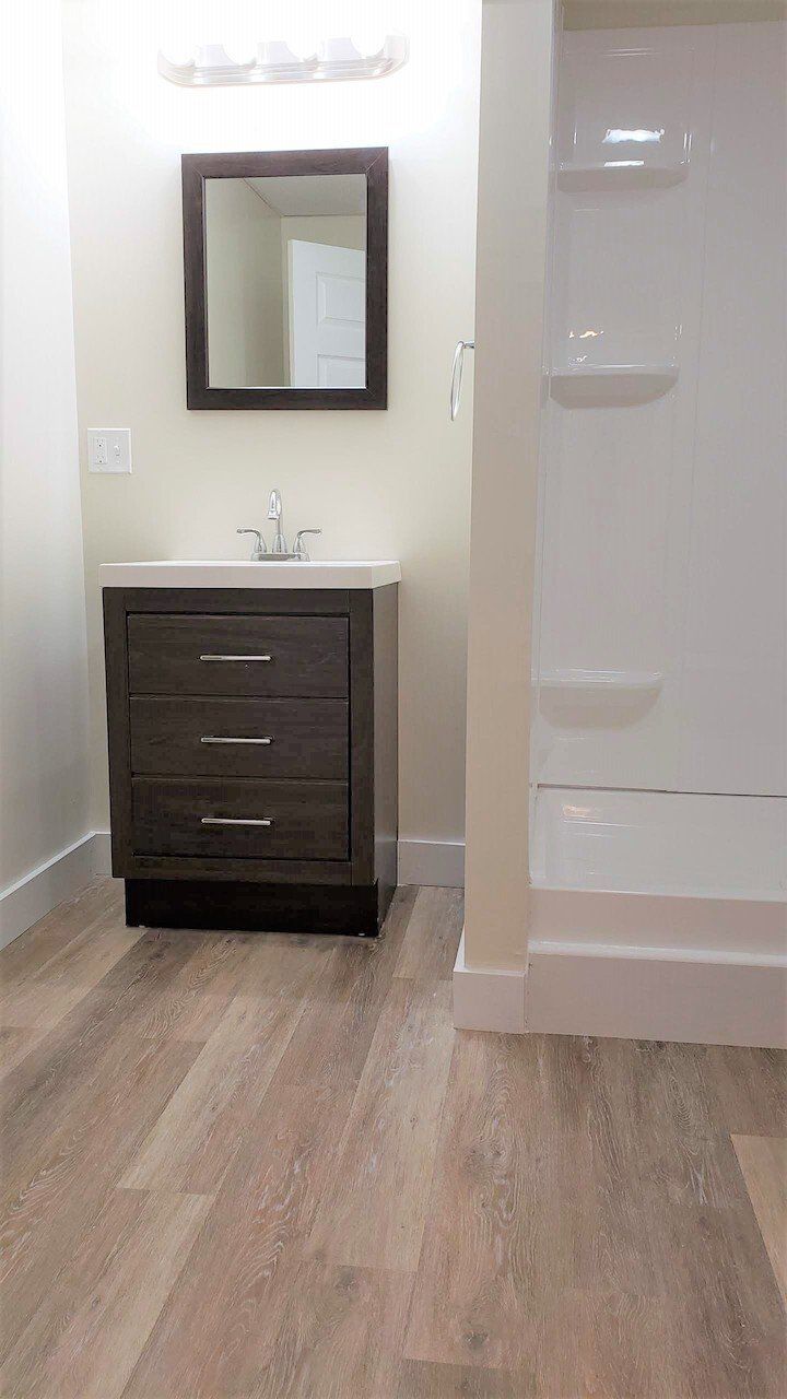 Oak Forest Village Bathroom sink and shower