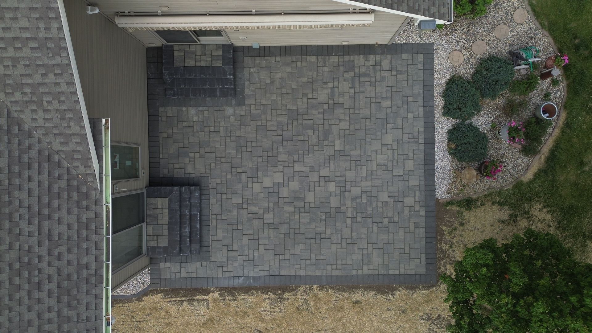 overhead view of a newly installed brick patio in Janesville, Wisconsin