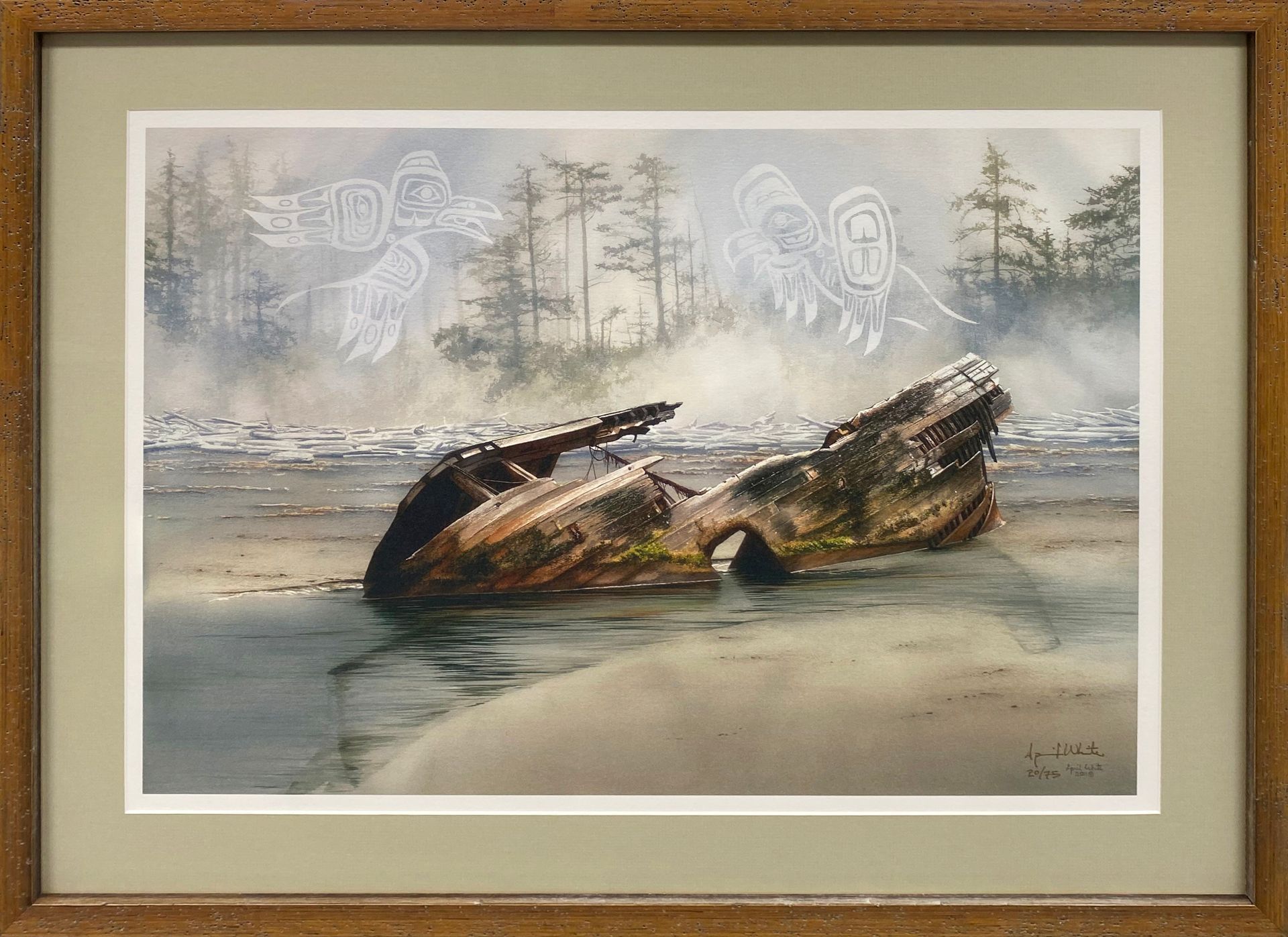 A framed painting of a boat wreck on the beach
