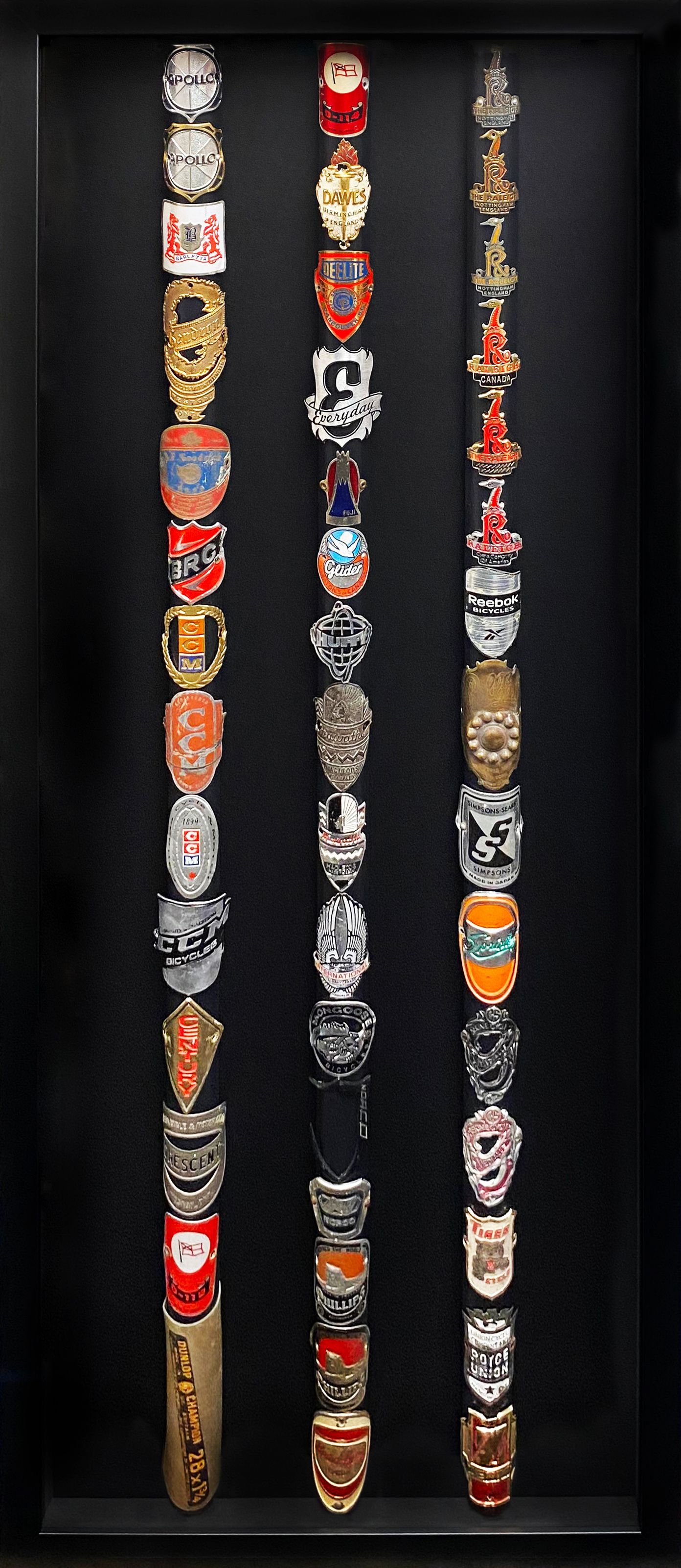 Three bracelets are lined up in a row on a black background.