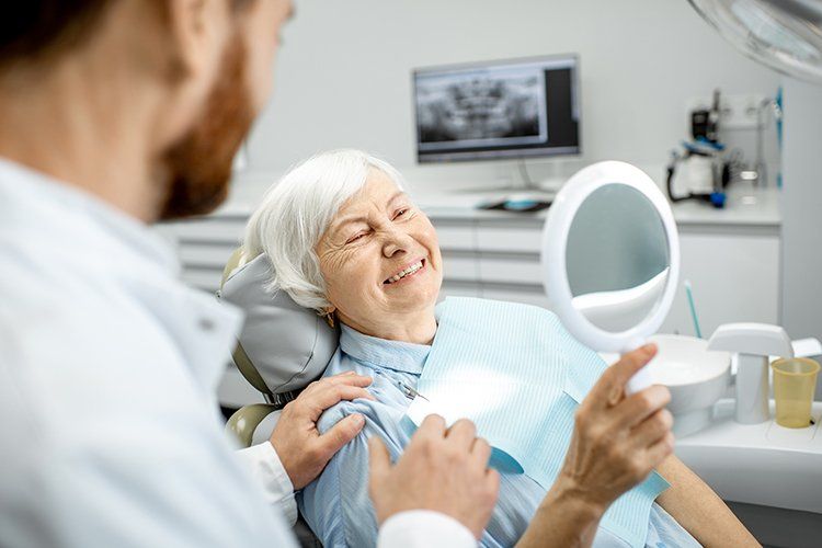 Elderly Woman Smiling at Dental Clinic — Liberty, MO — Triplett Dental
