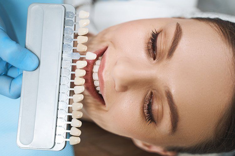 Girl in Dental Chair Choosing Veneers — Liberty, MO — Triplett Dental