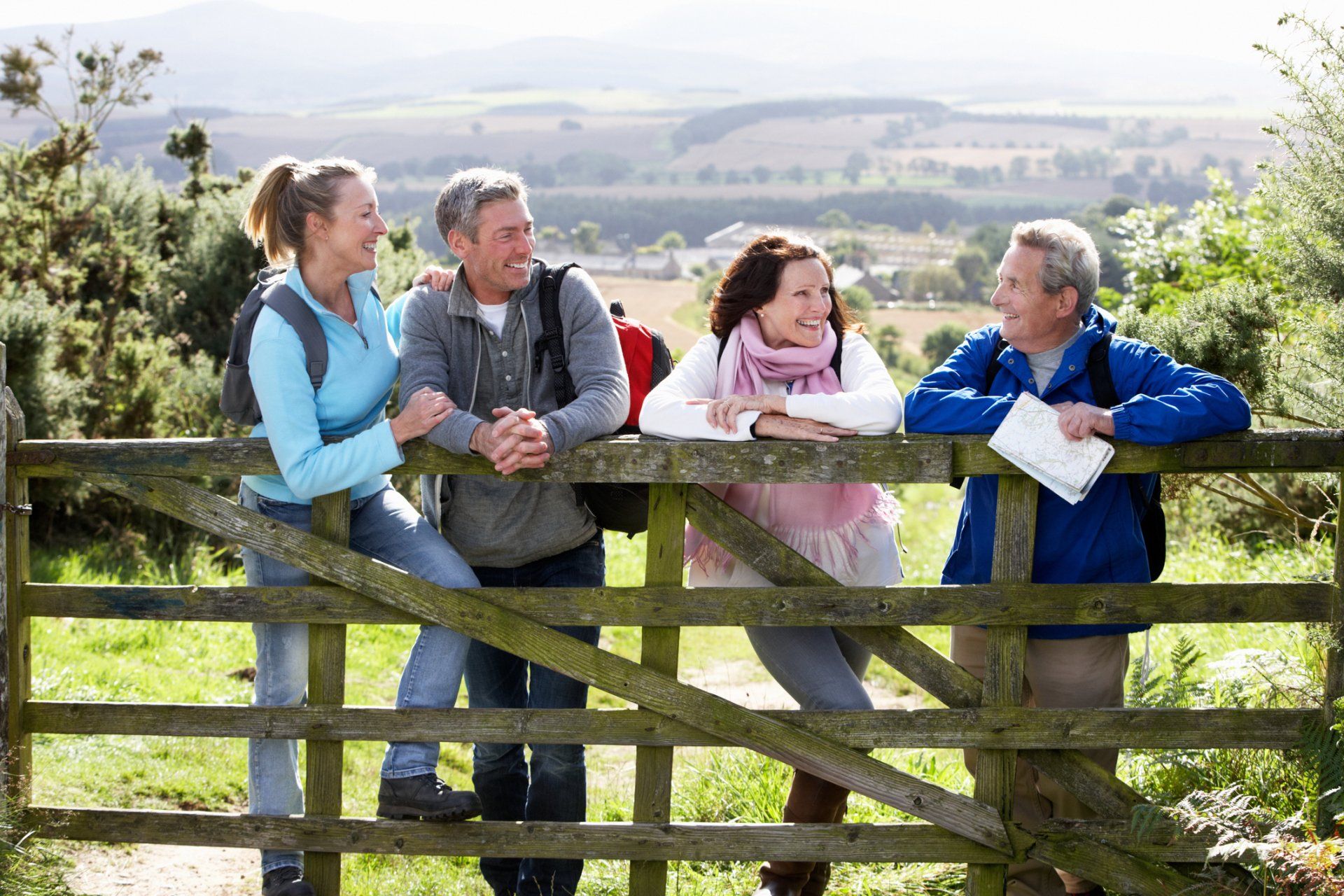 Group of four friends on a country walk
