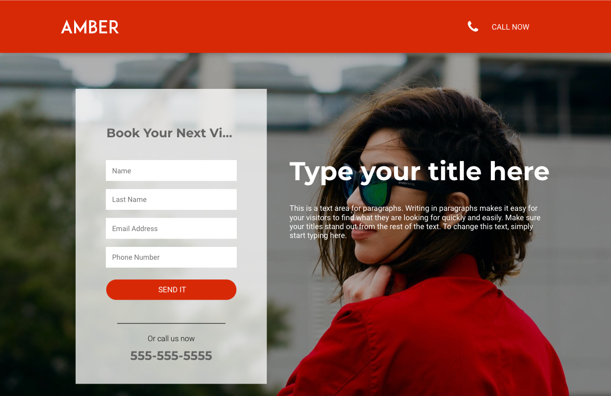 A woman wearing sunglasses and a red jacket is standing in front of a building.