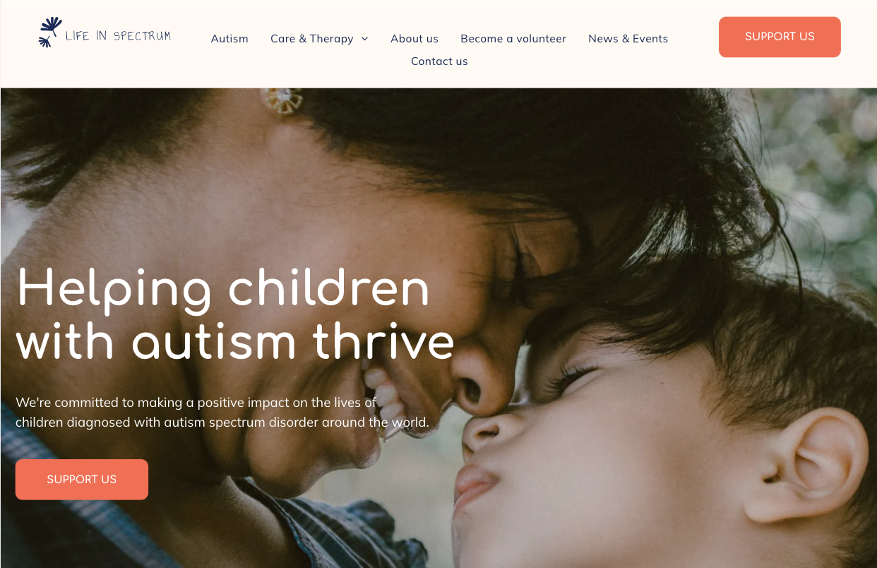A woman is holding a child in her arms and the website says helping children with autism thrive