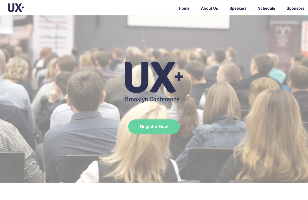 A group of people are sitting in a conference room.