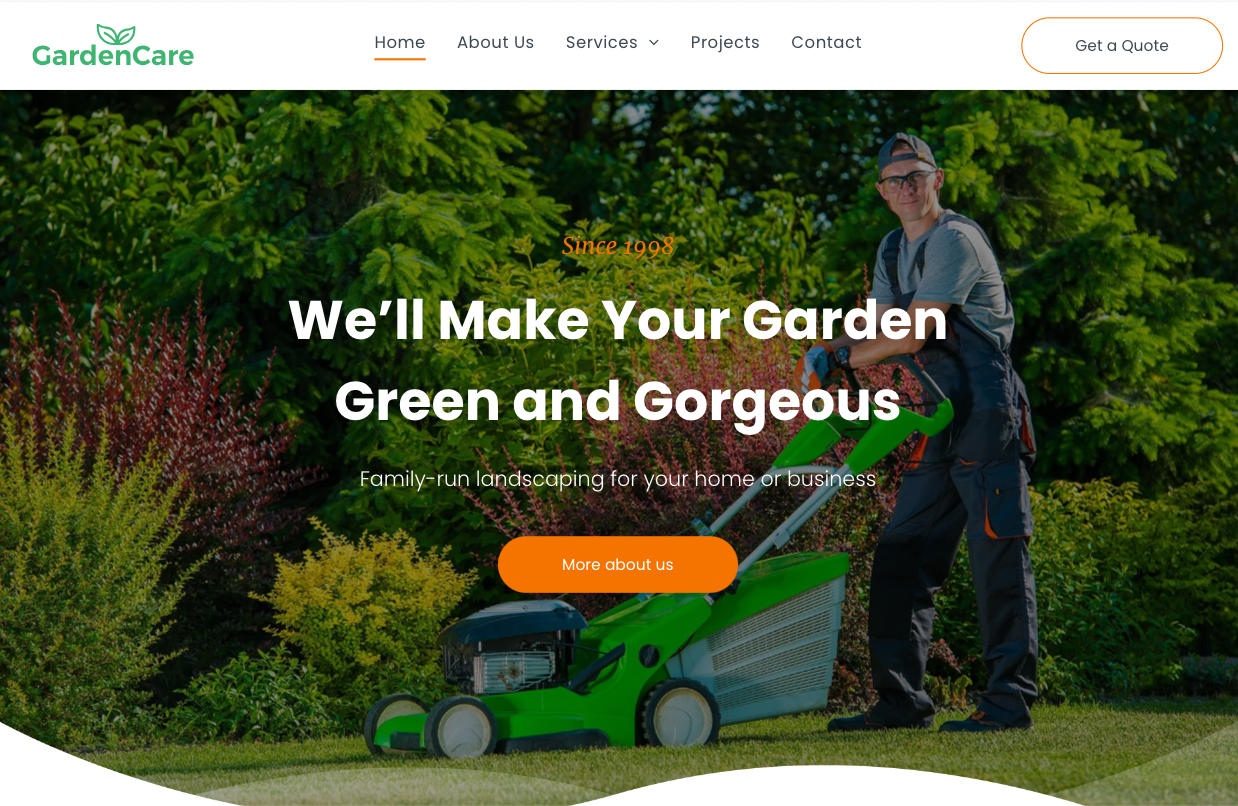 A man is mowing the grass with a green lawn mower.