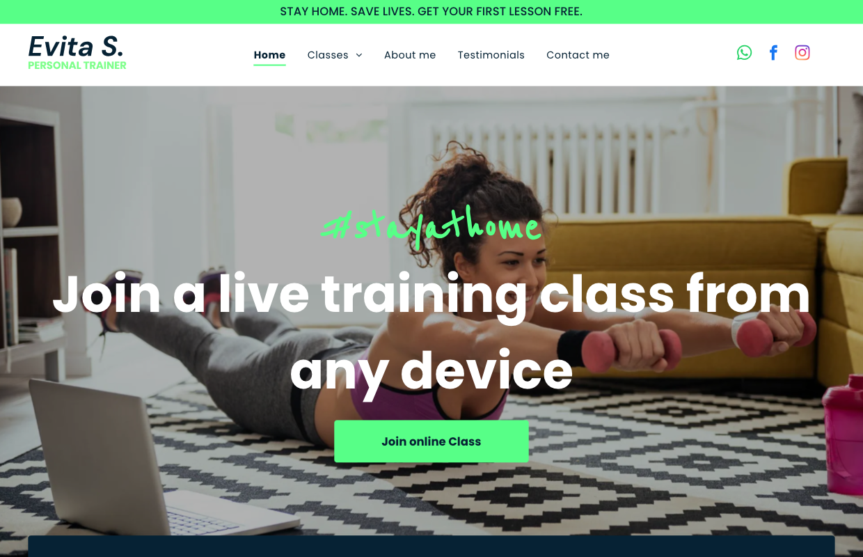 A woman is laying on the floor holding dumbbells and a laptop.