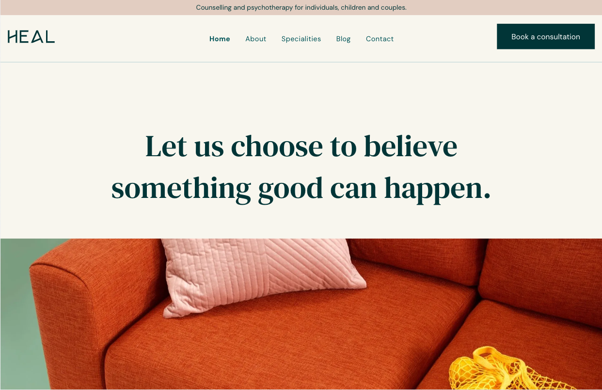 A couch with a pillow on it and the words `` let us choose to believe something good can happen ''
