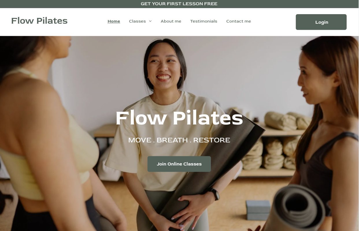 A group of women are standing next to each other holding yoga mats.