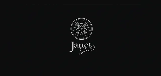 A black and white logo with a wheel and the word janet on it.