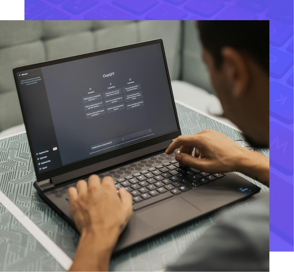 Person typing on a laptop with a dark screen, likely working on a project.