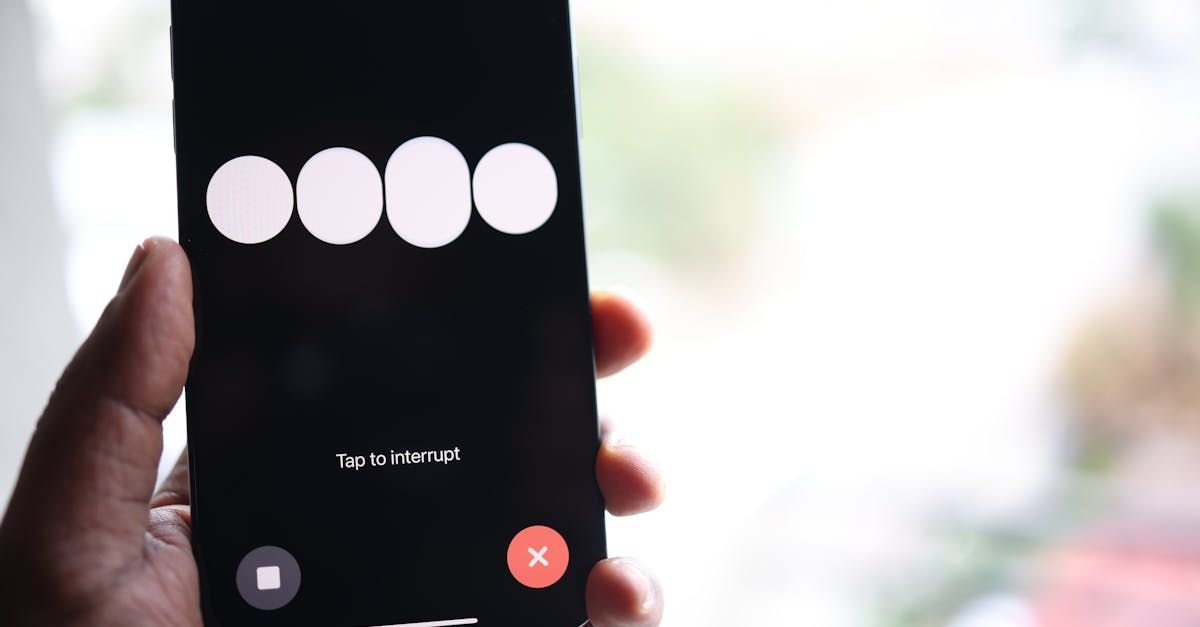 A person is holding a cell phone in their hand.