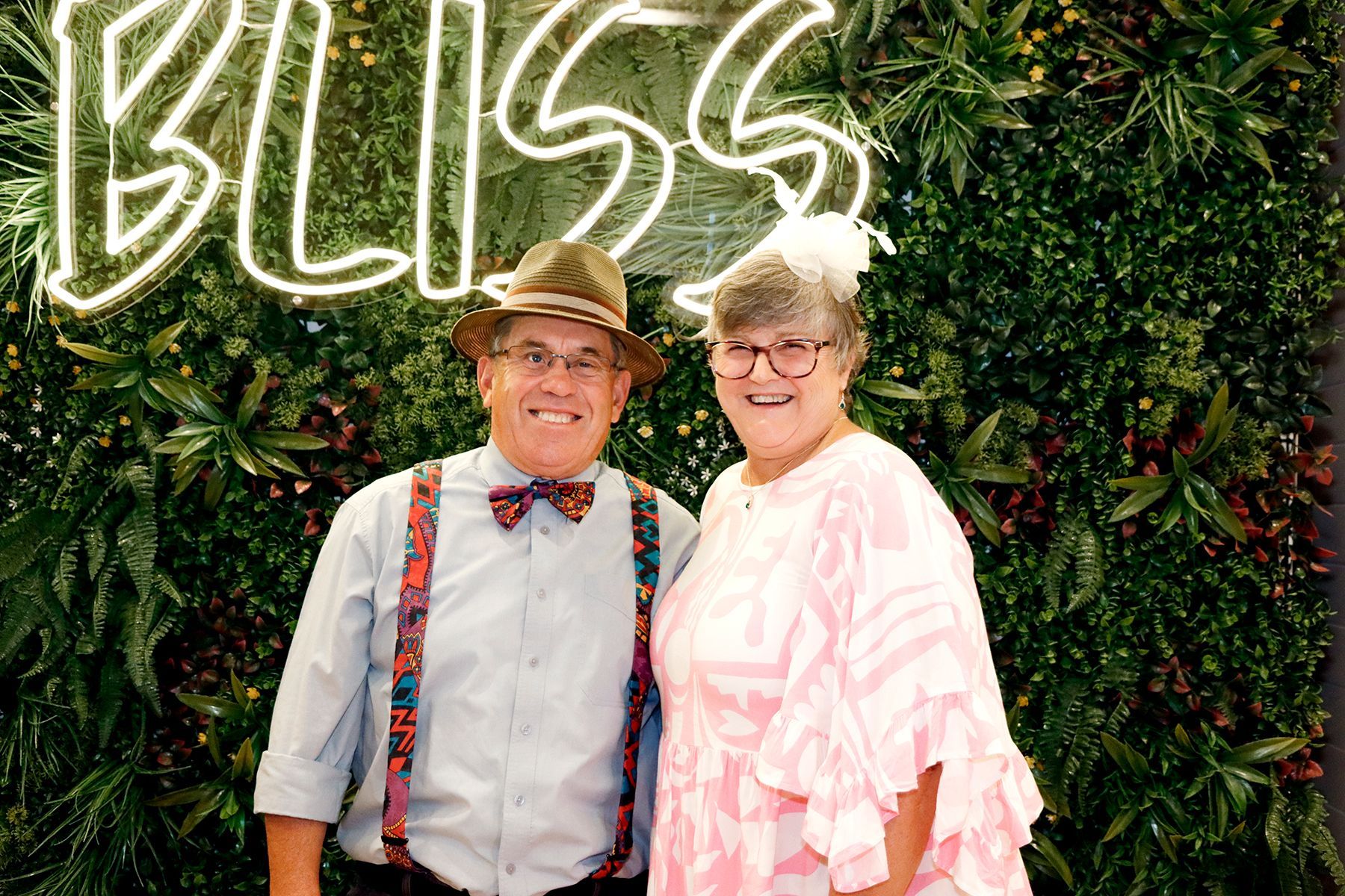 Couple smiling in front of 