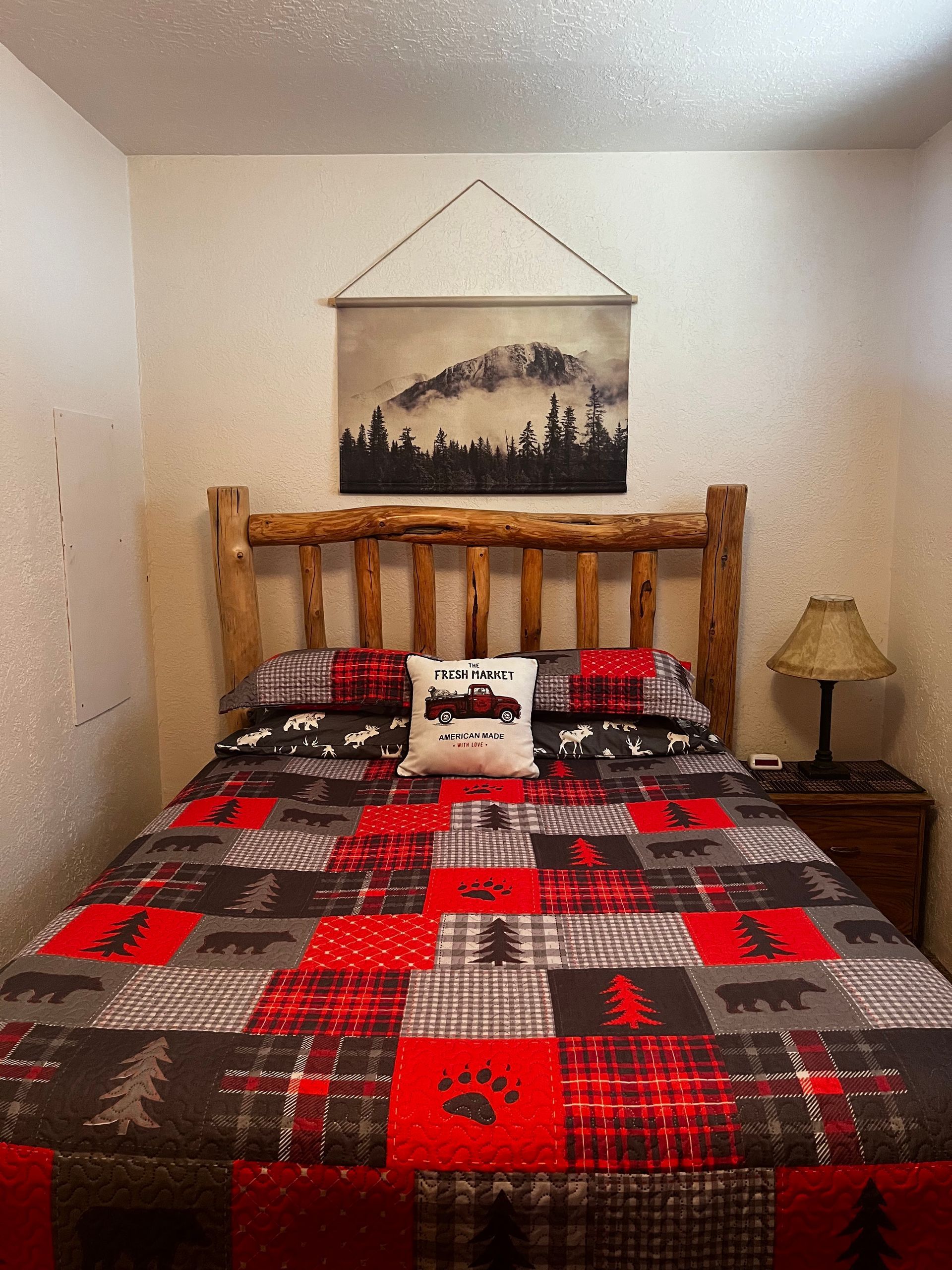 a kitchen with wooden cabinets and stainless steel counter tops