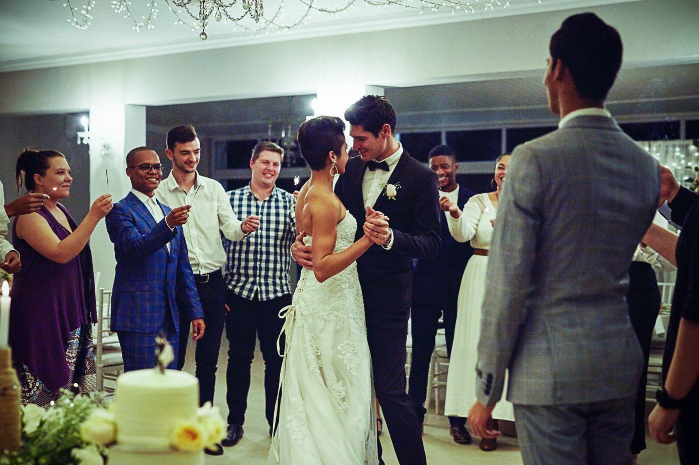 A couple dances at a small wedding reception in Central Indiana.