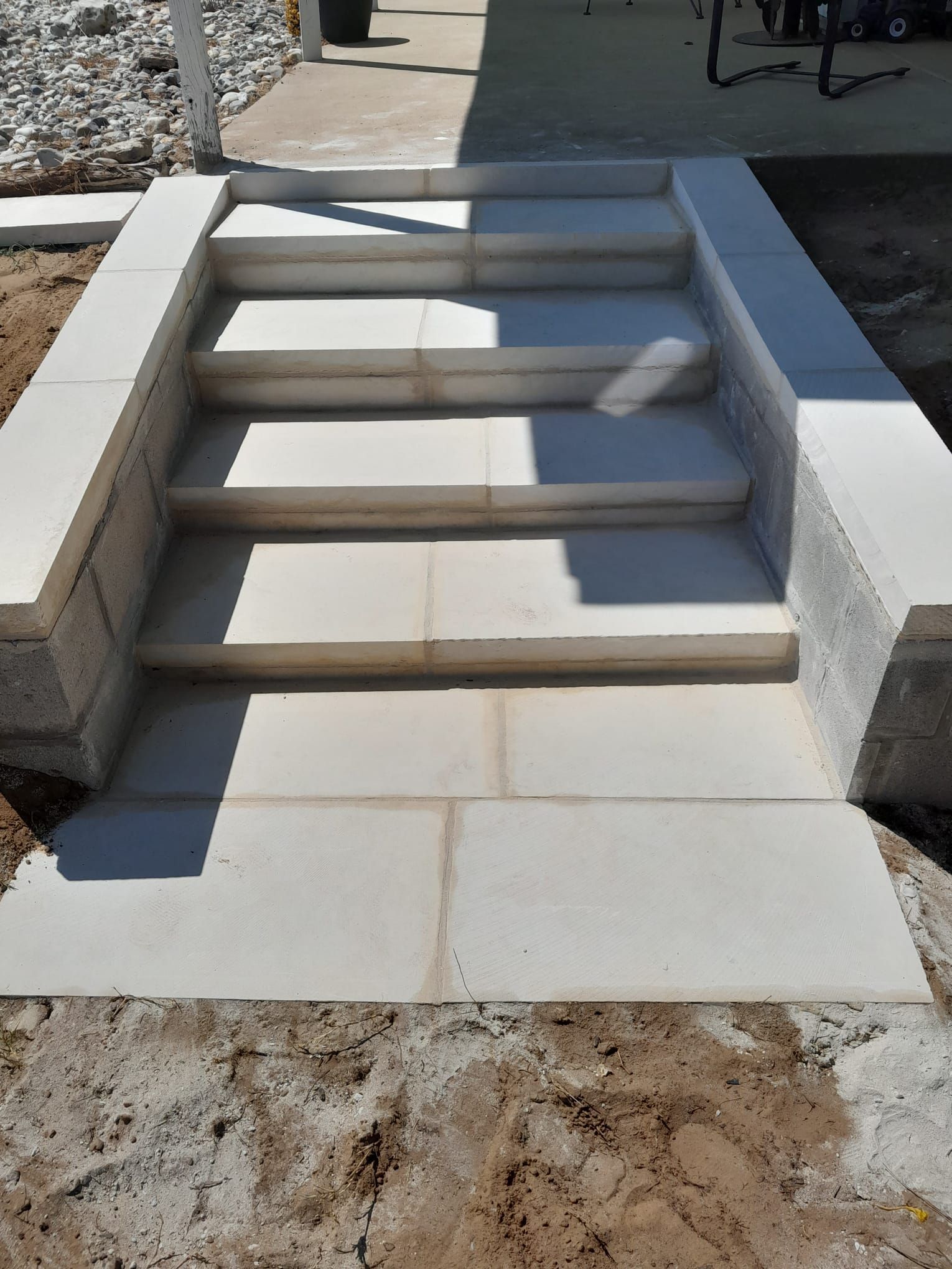 A set of stairs that are being built in the dirt