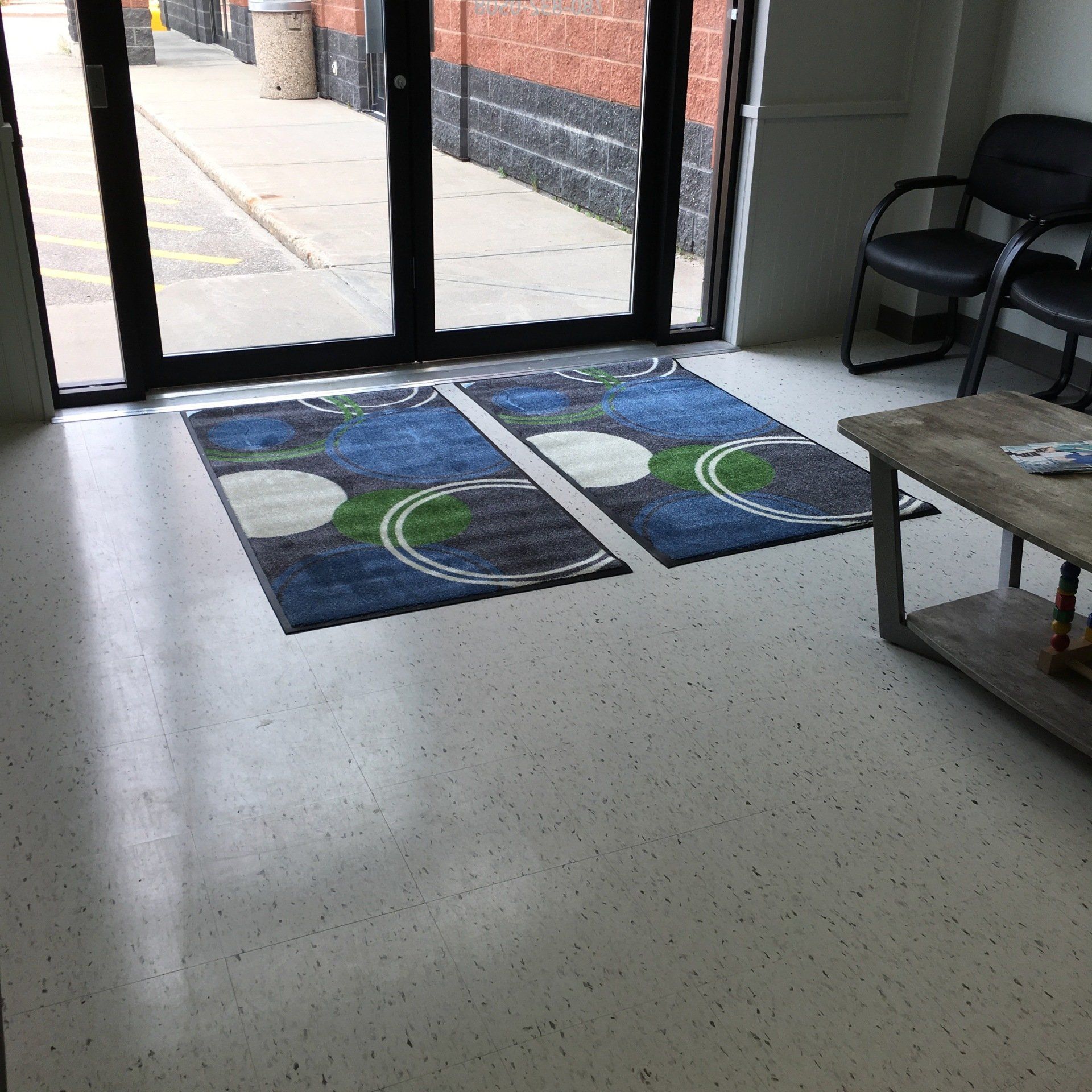 Enhance the appearance of your business with a custom mat from Spring Fresh