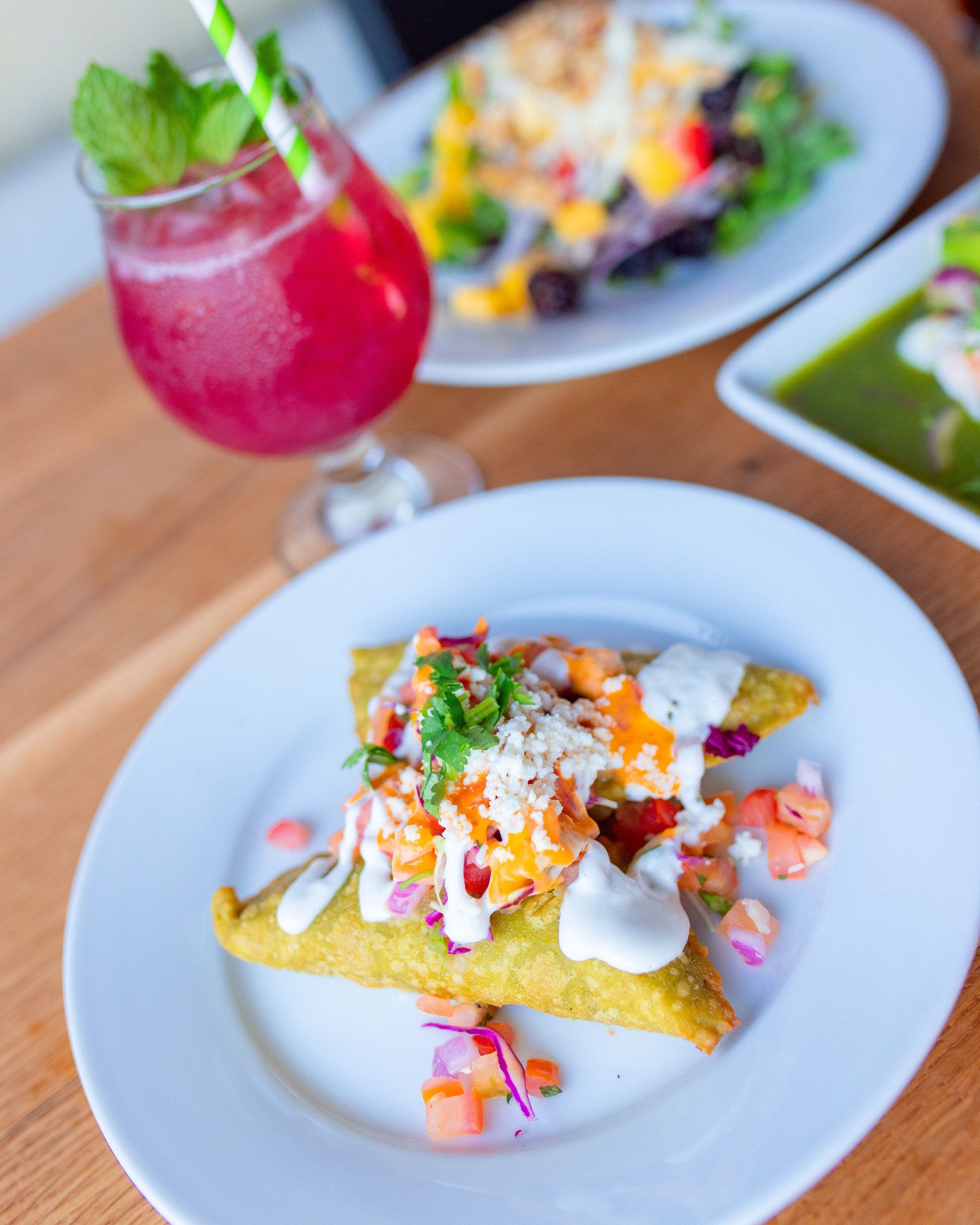 empanadas and a cocktail