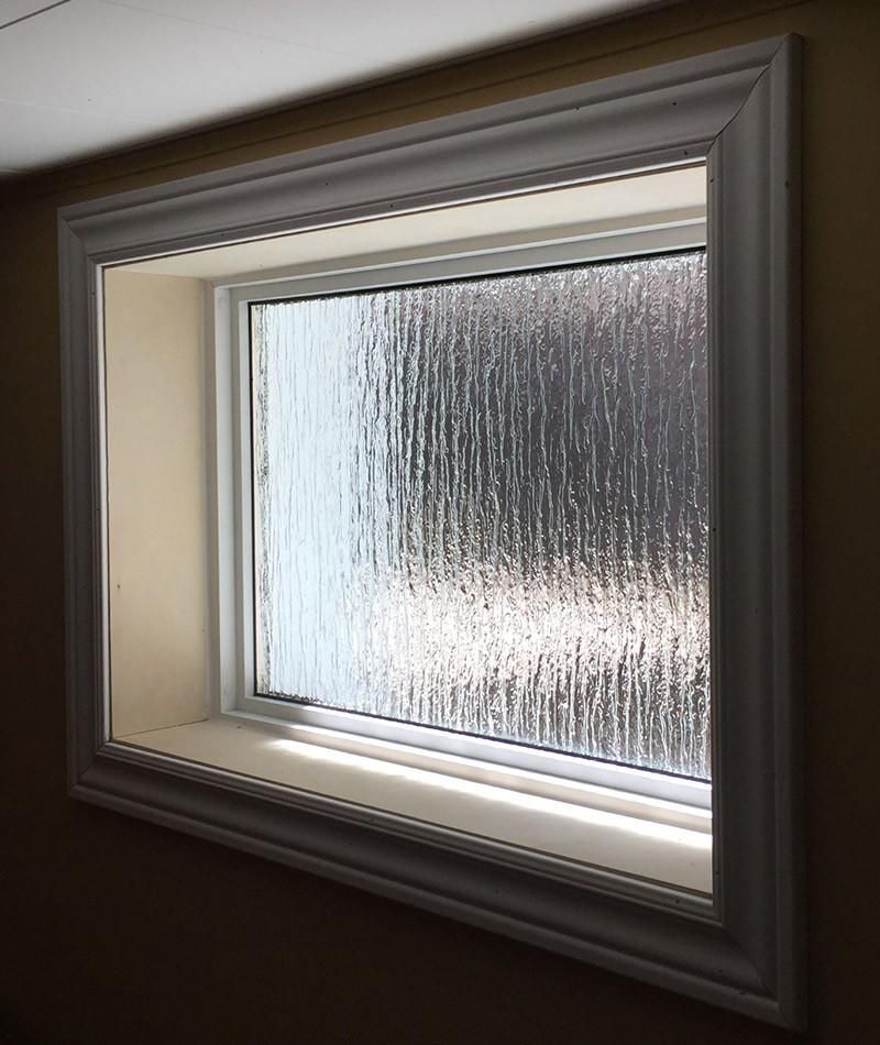 A window with a white frame and a clear glass