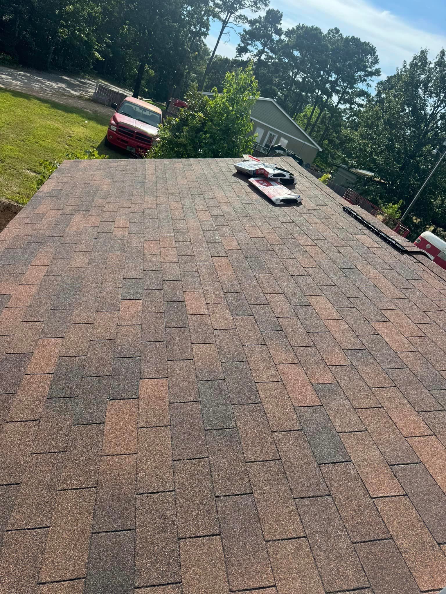 A close up of a roof with shingles on it.
