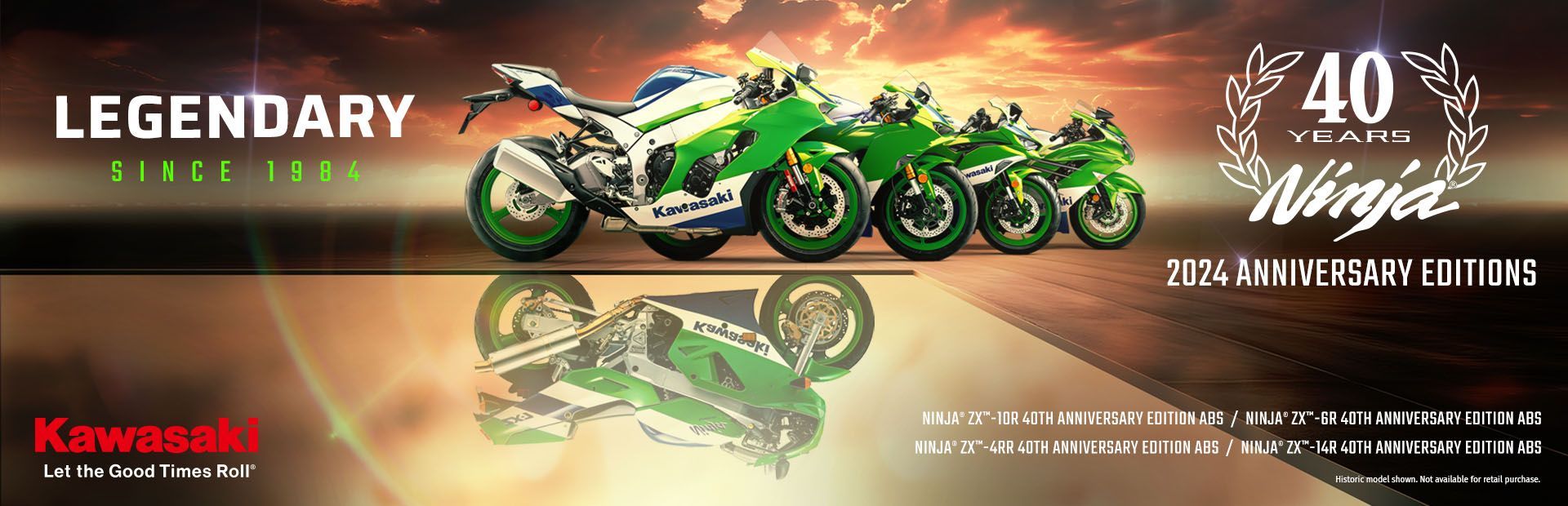 A group of motorcycles are parked next to each other on a road.