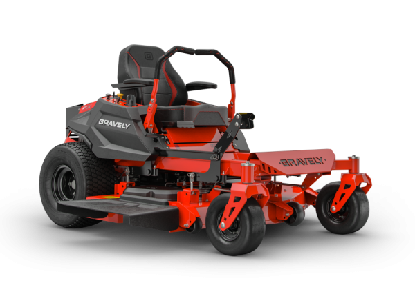 A red and black lawn mower is sitting on a white surface.