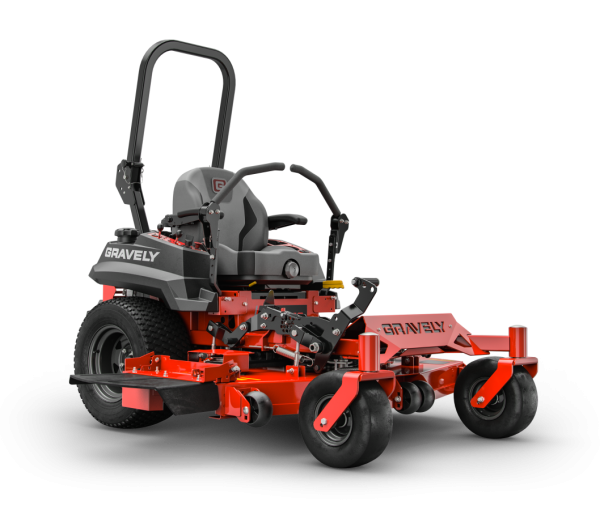 A red and black lawn mower is sitting on a white surface.